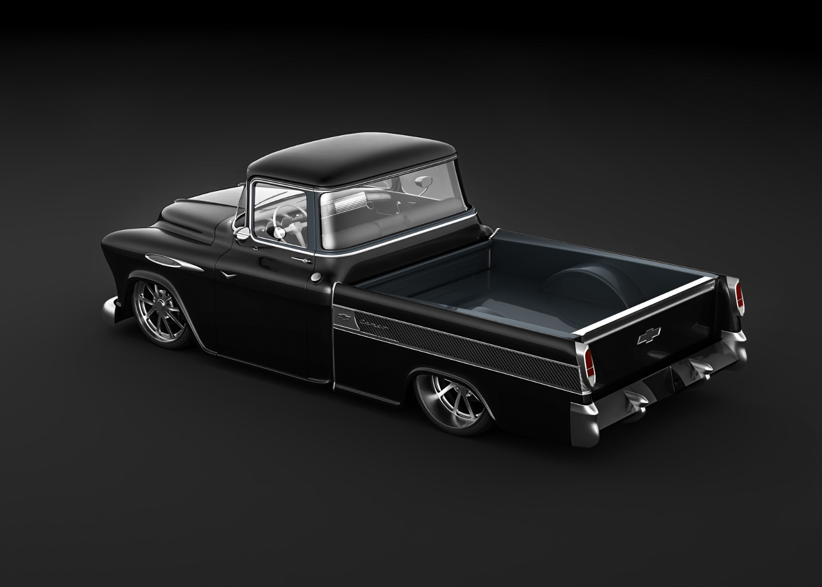 Rear three-quarter showing the bed detail and chrome.