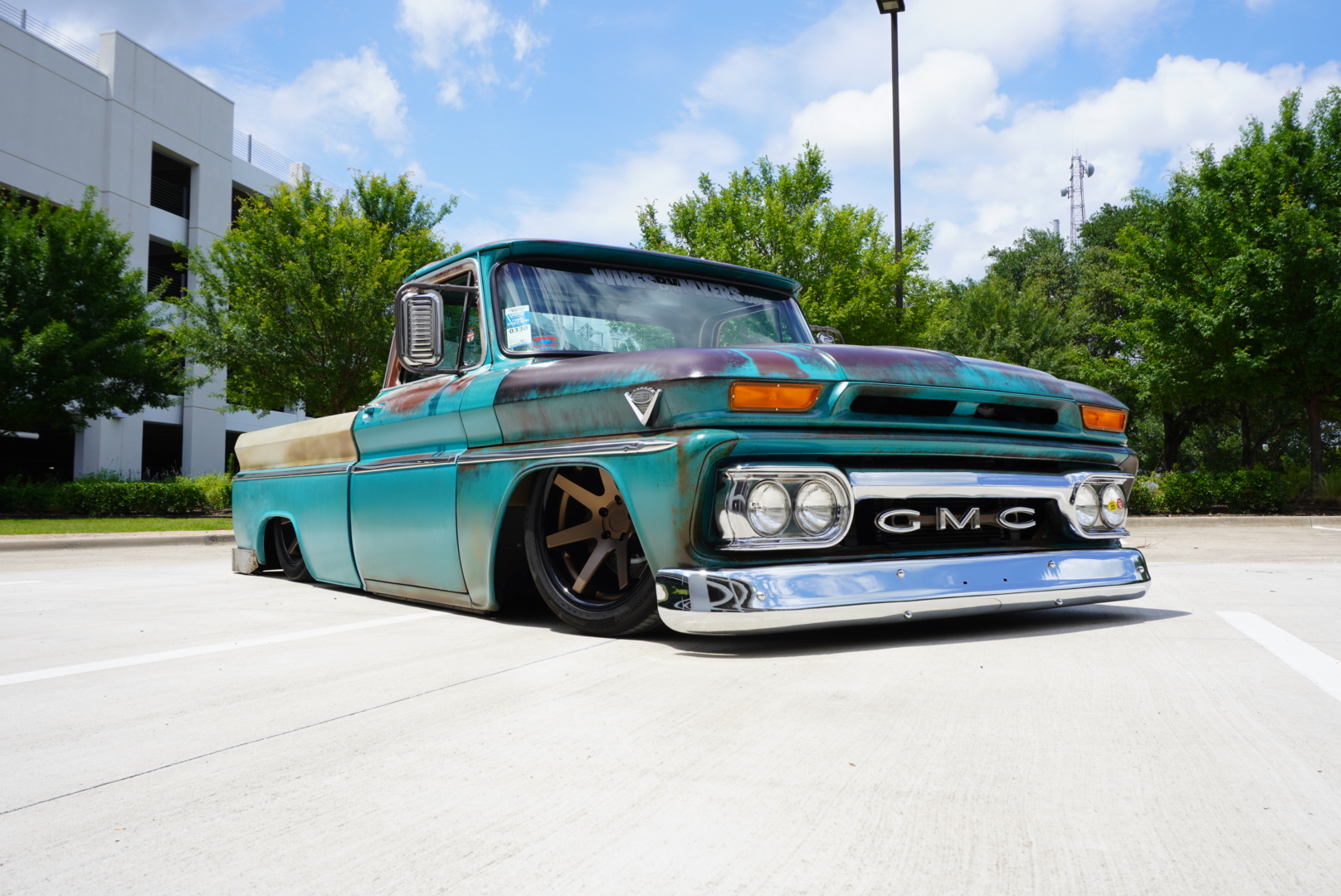 Passenger-side head-on angle, laid out low.