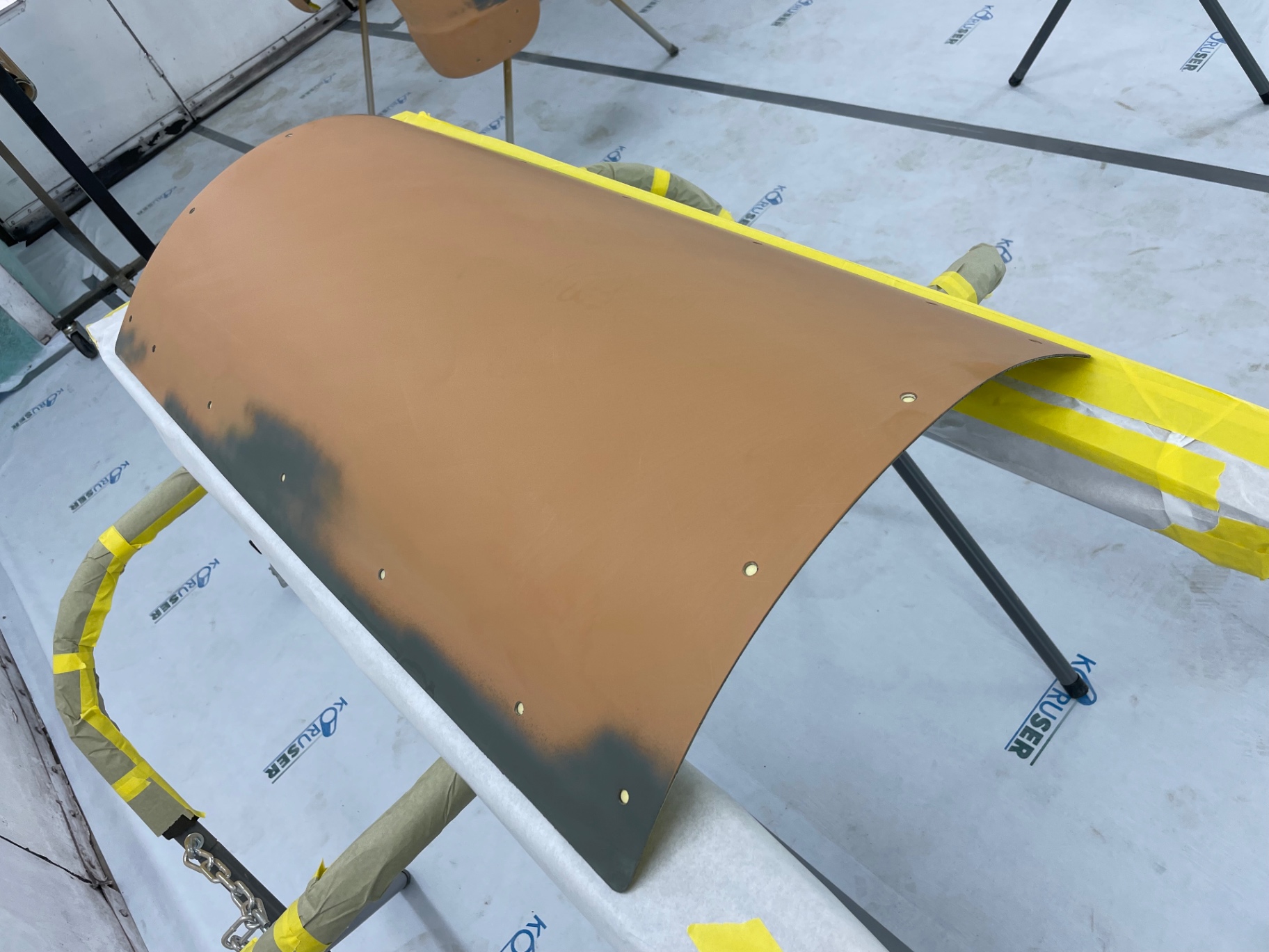 Radiator cover after block sanding — surface reading straight from every angle.