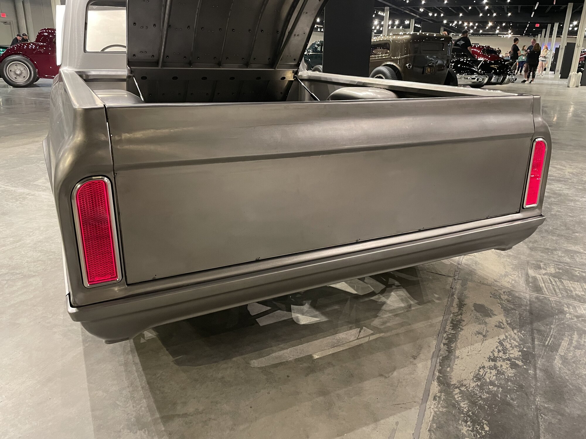 Tailgate down at the show — nothing hidden underneath.