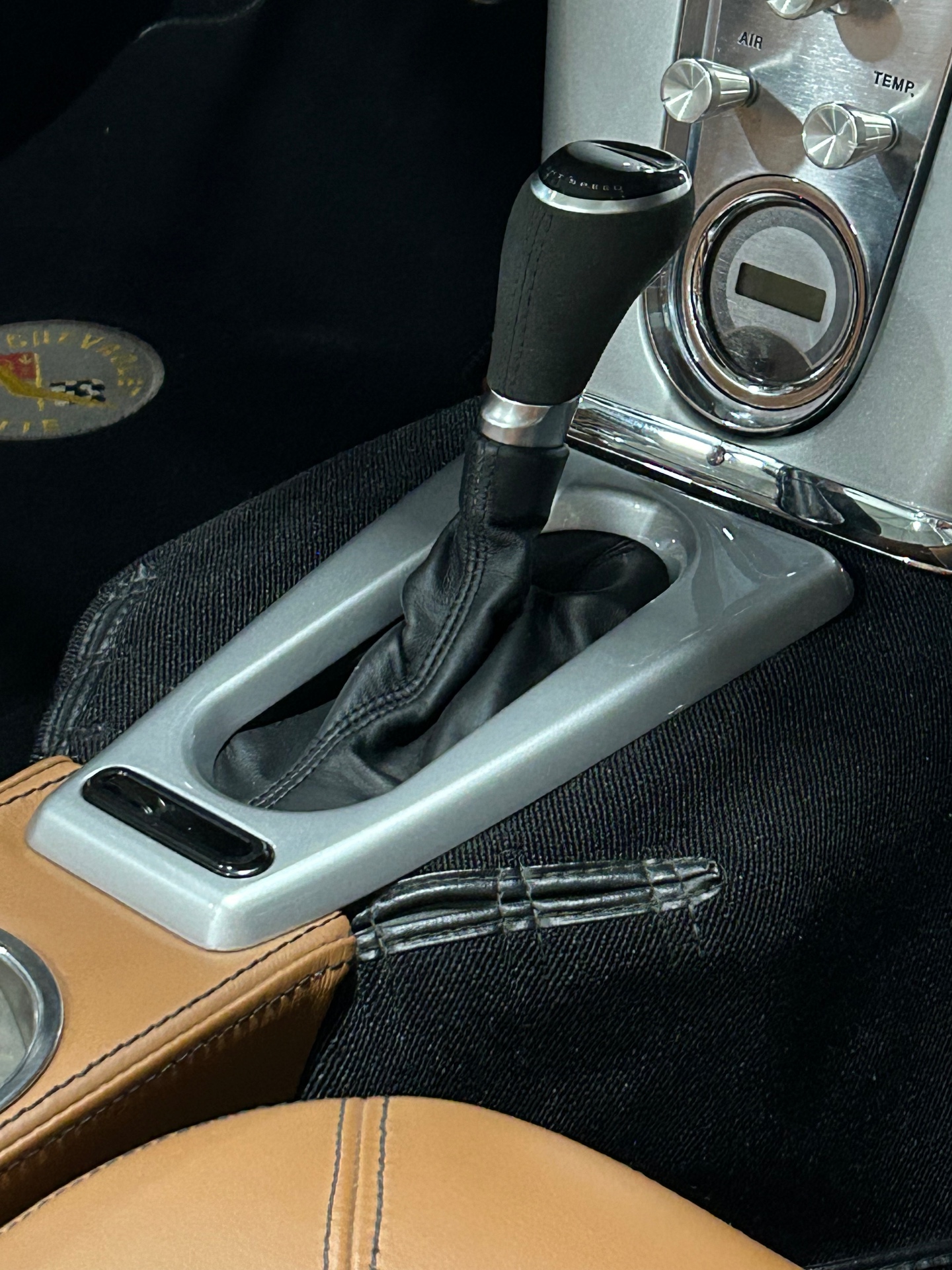 Installed in a 1962 Corvette with the updated shifter handle.