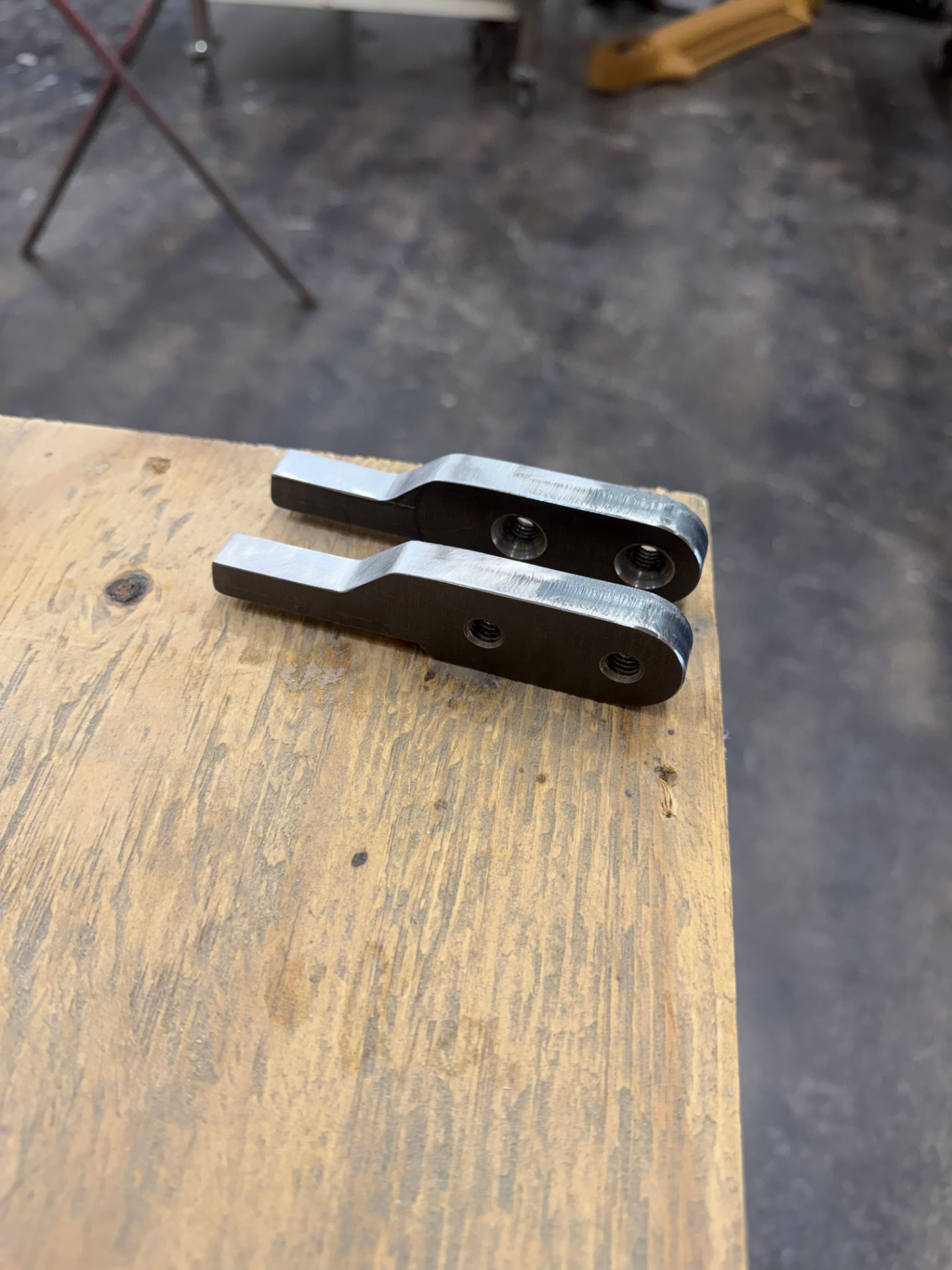Machined billet stops fresh off the mill.
