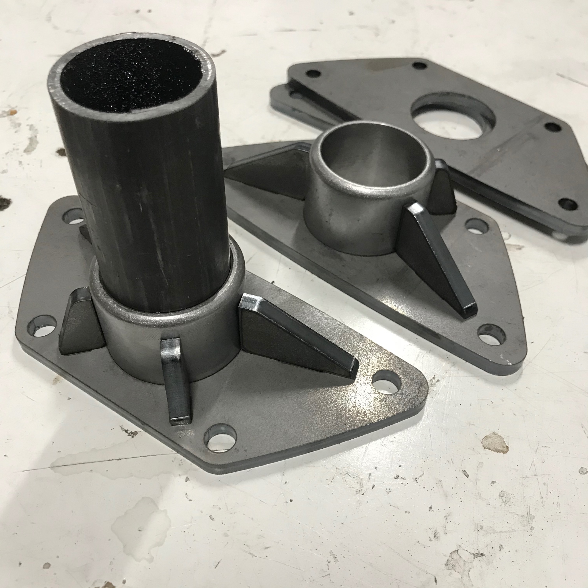 Base plates and column bung — gusseted for stiffness before final welding.