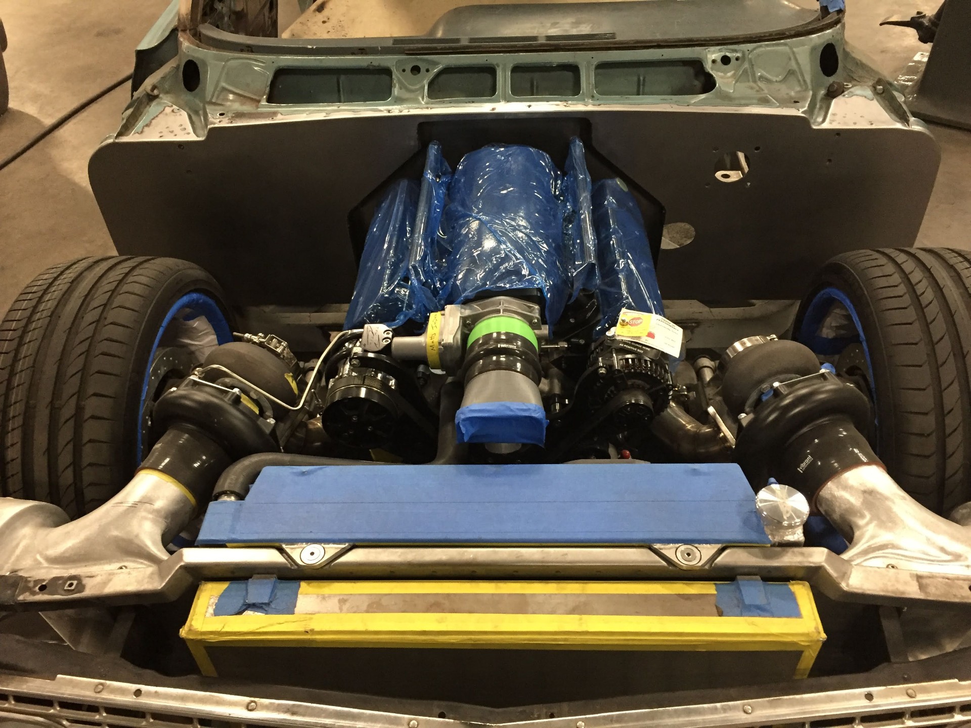 Front-end mockup — twin turbos in the fenders, PWR intercooler taped up on the front, plenum blank on top.
