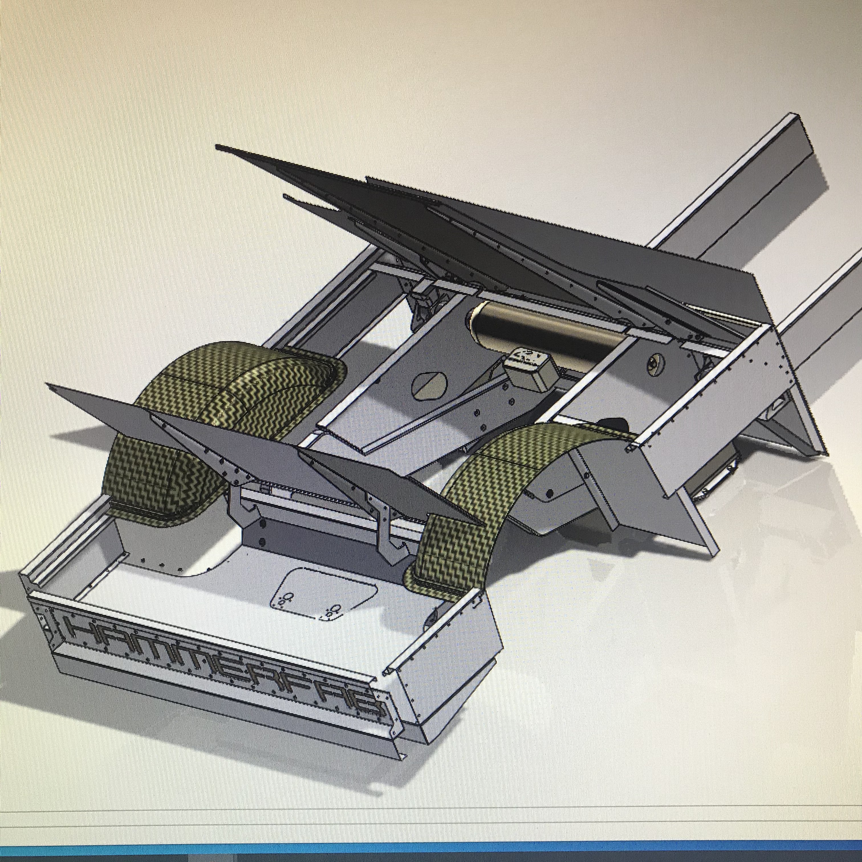 SolidWorks rendering of the shortened bed structure and tilting floor layout by Levi Green.