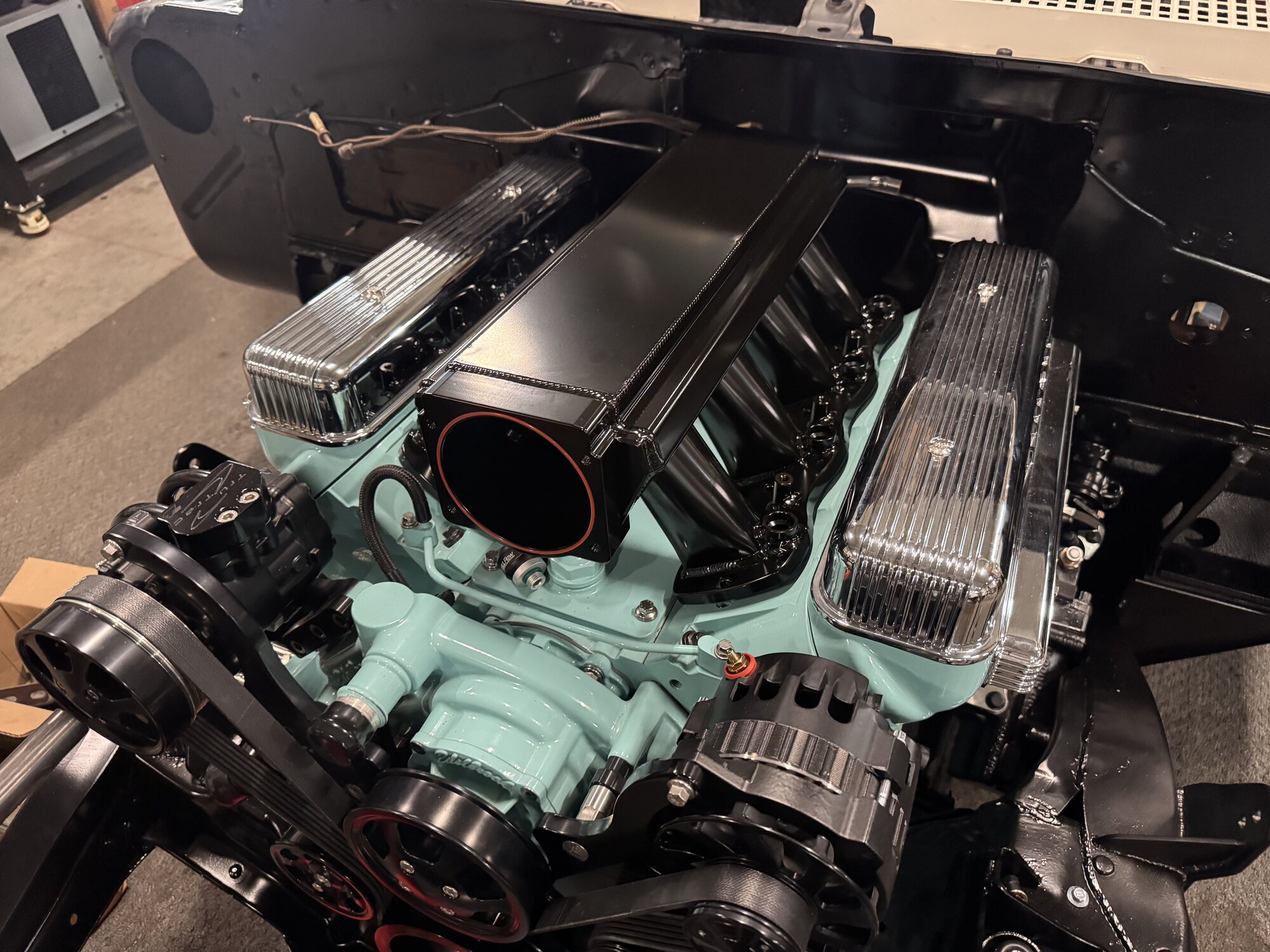 Angled view showing how low the intake sits so the throttle body clears the hood