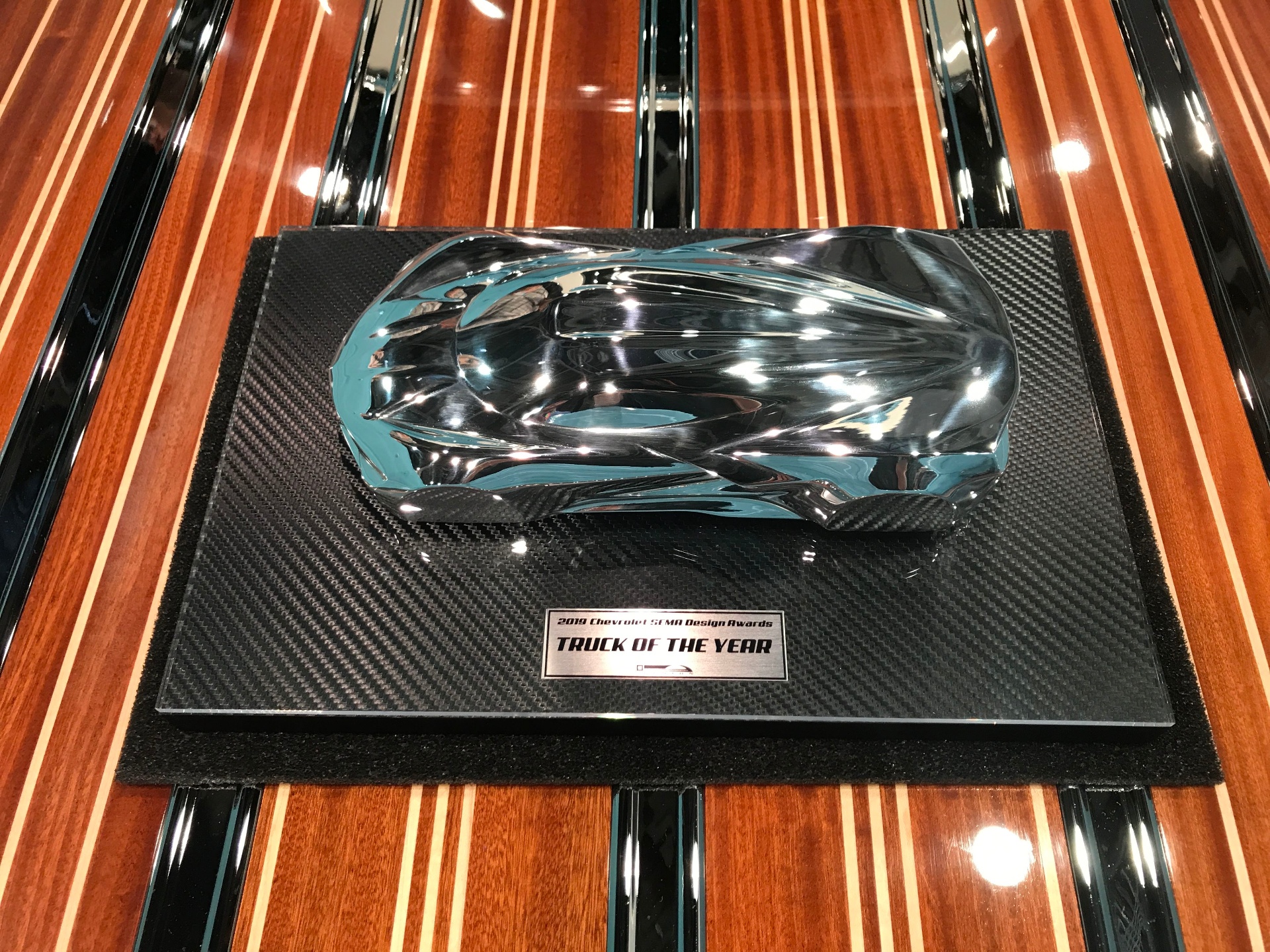 The 2019 Chevrolet SEMA Design Awards trophy — Truck of the Year — polished chrome sculpture on a carbon-fiber base.