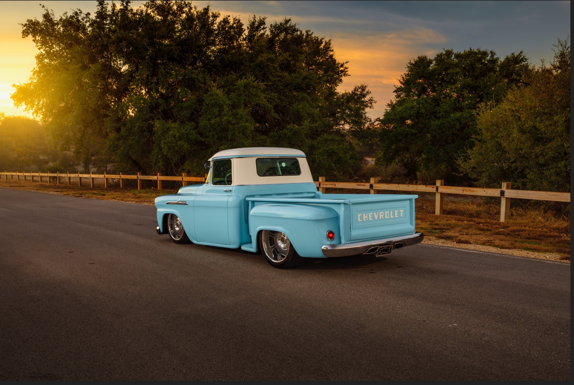 58 Apache photographed by Robert McGaffin for Wheel Hub Magazine — period Chevy blue over white at sunset.