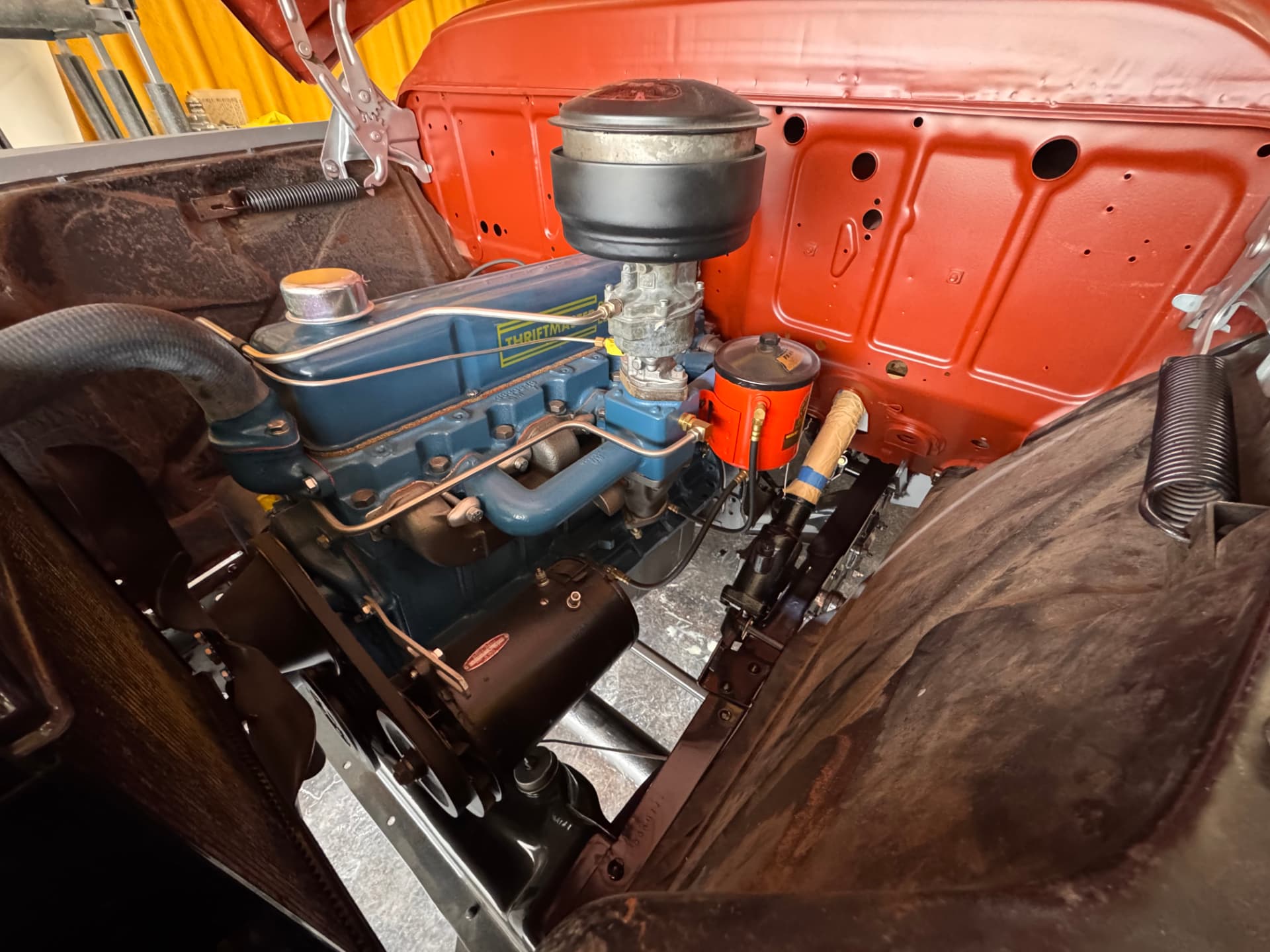 The Thriftmaster inline six, cleaned up and running.