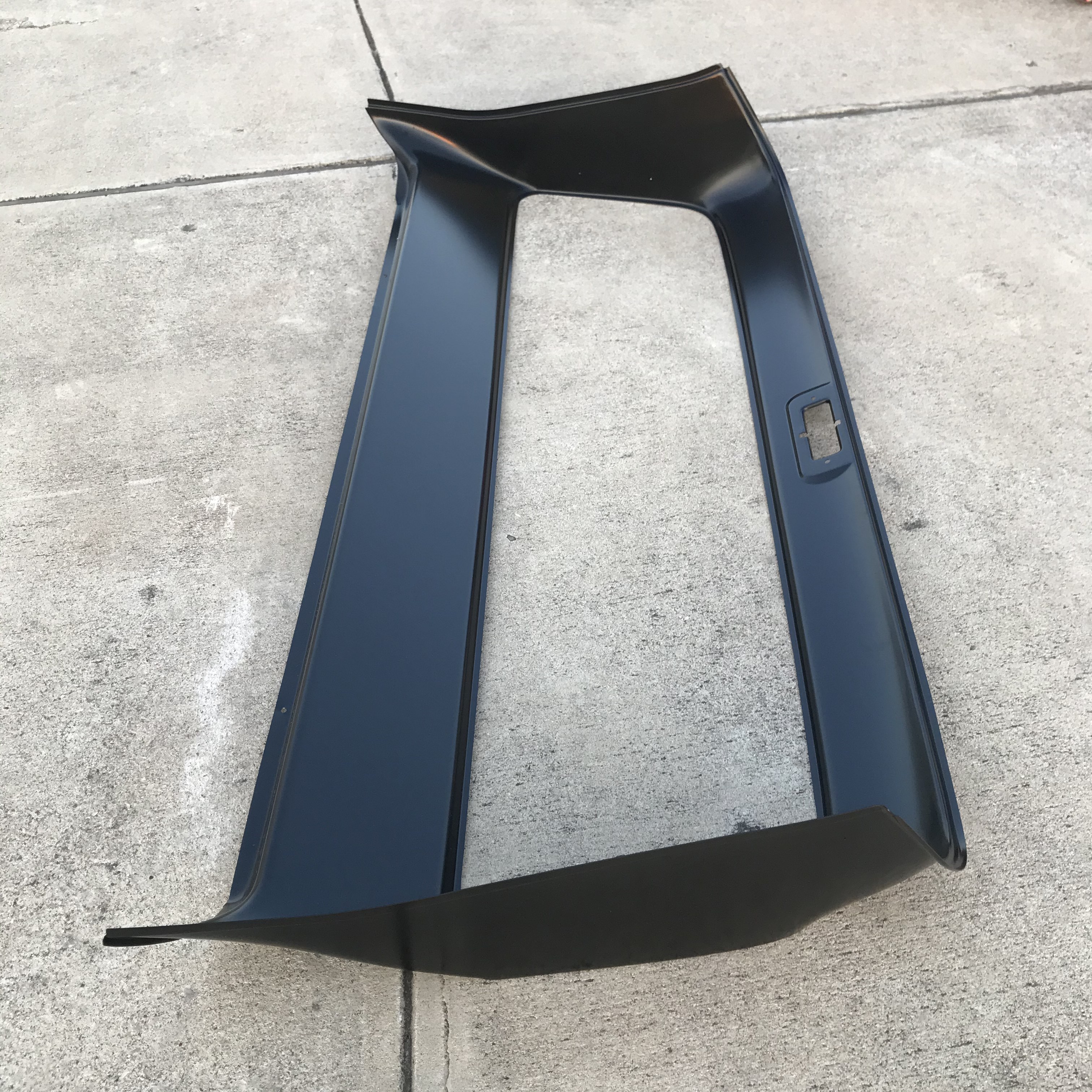 Freshly prepped inner bed panel in satin black before being tucked back into the truck.