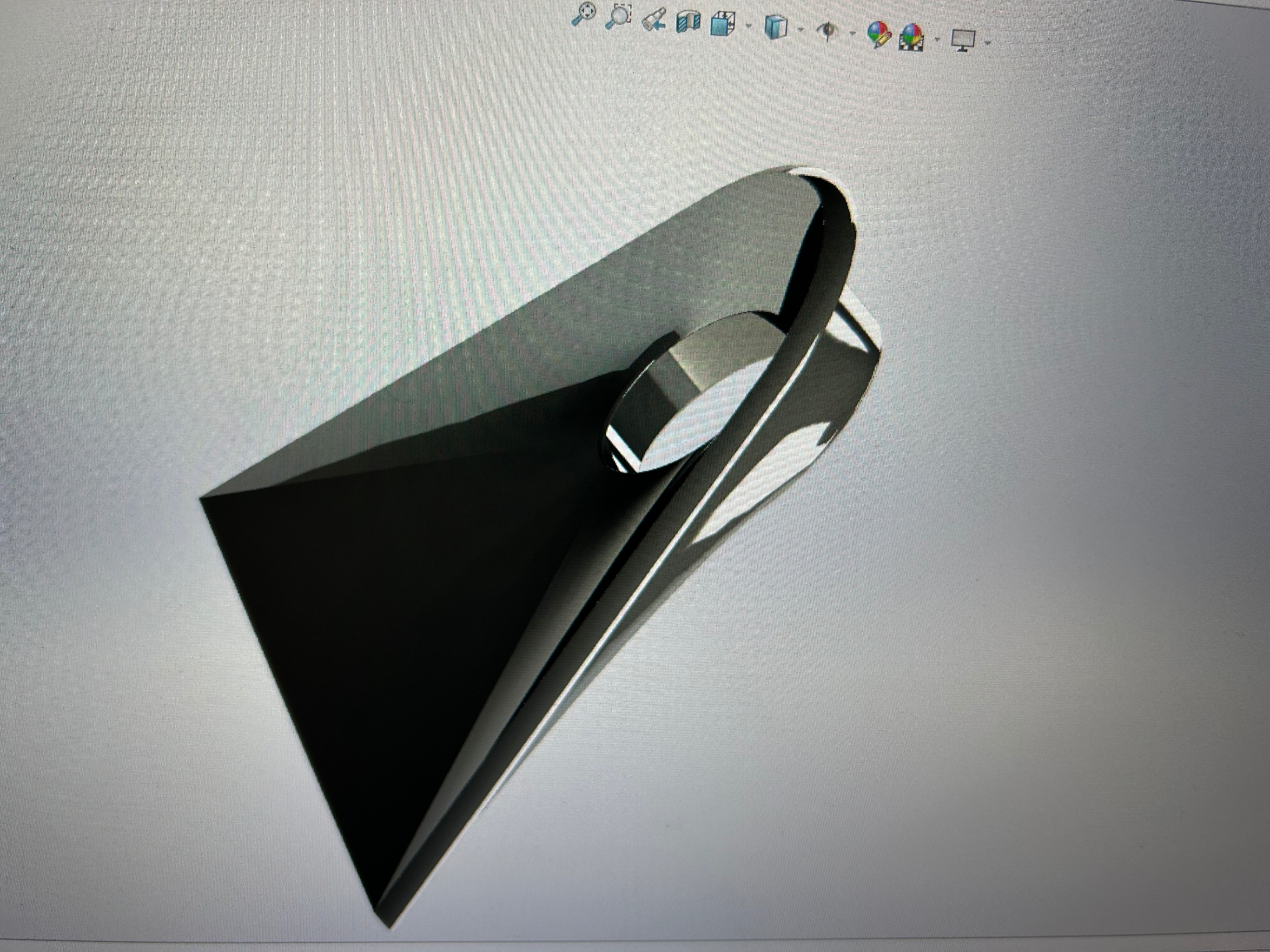 SolidWorks screen capture of the angled forward face — the geometry that clears the driveshaft tunnel.