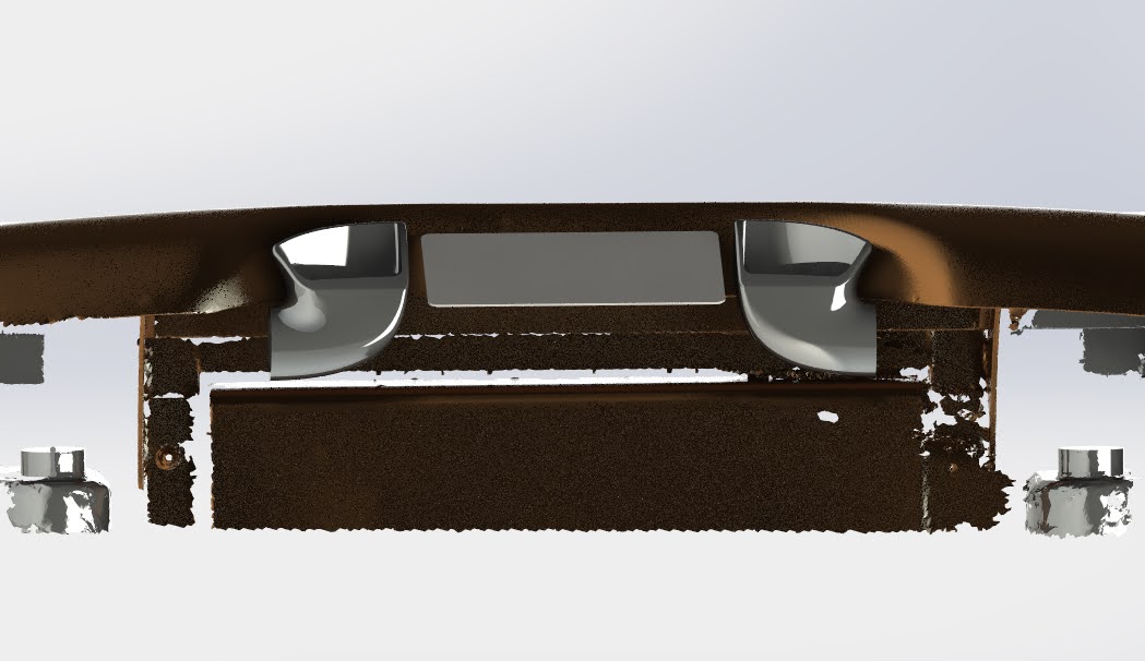 Rear view — exhaust tips tucked tight to the bumper valance.