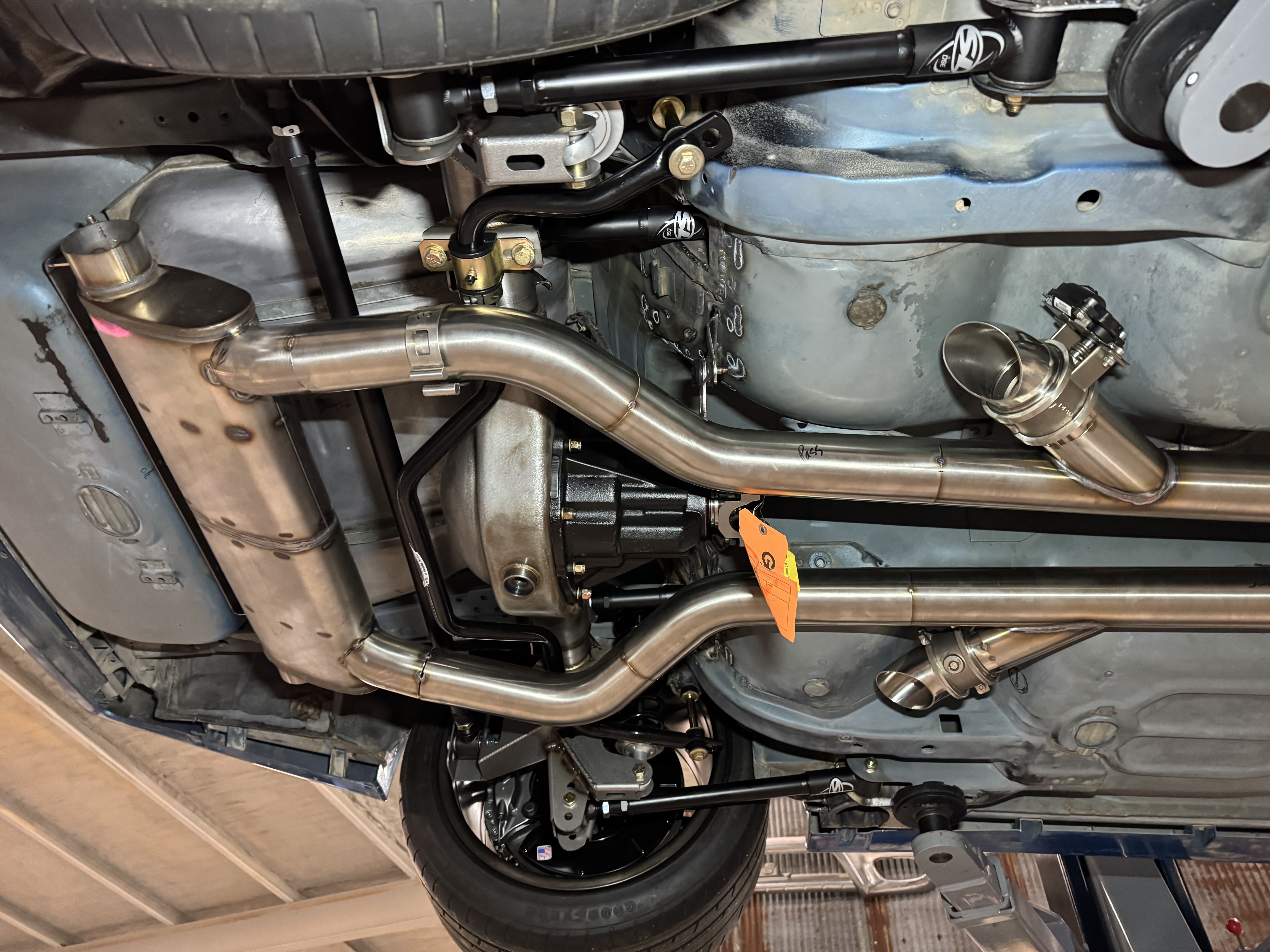 Electric cutouts and tight routing around the Detroit Speed rear suspension.