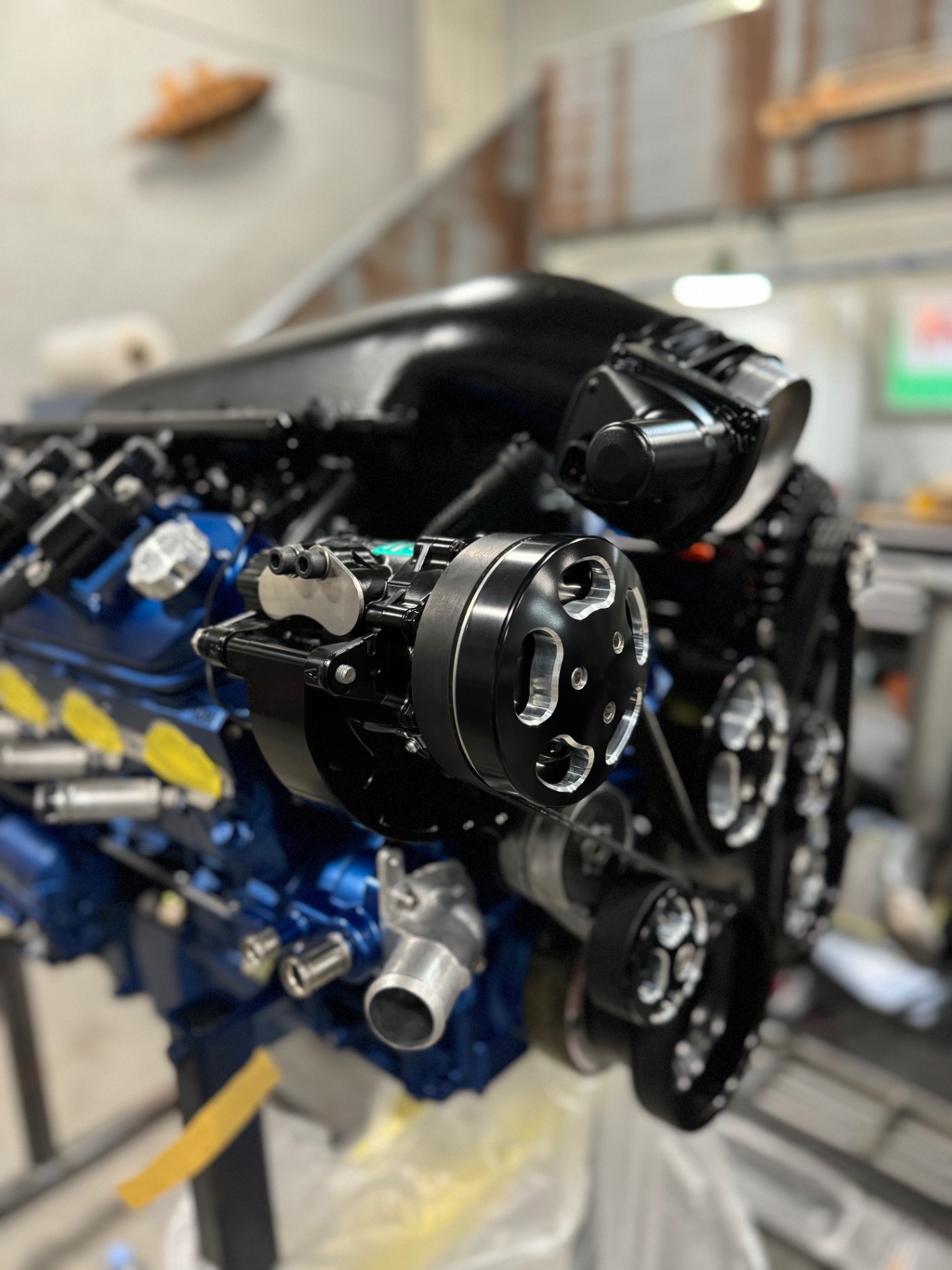 Power steering pump and accessory drive detail.