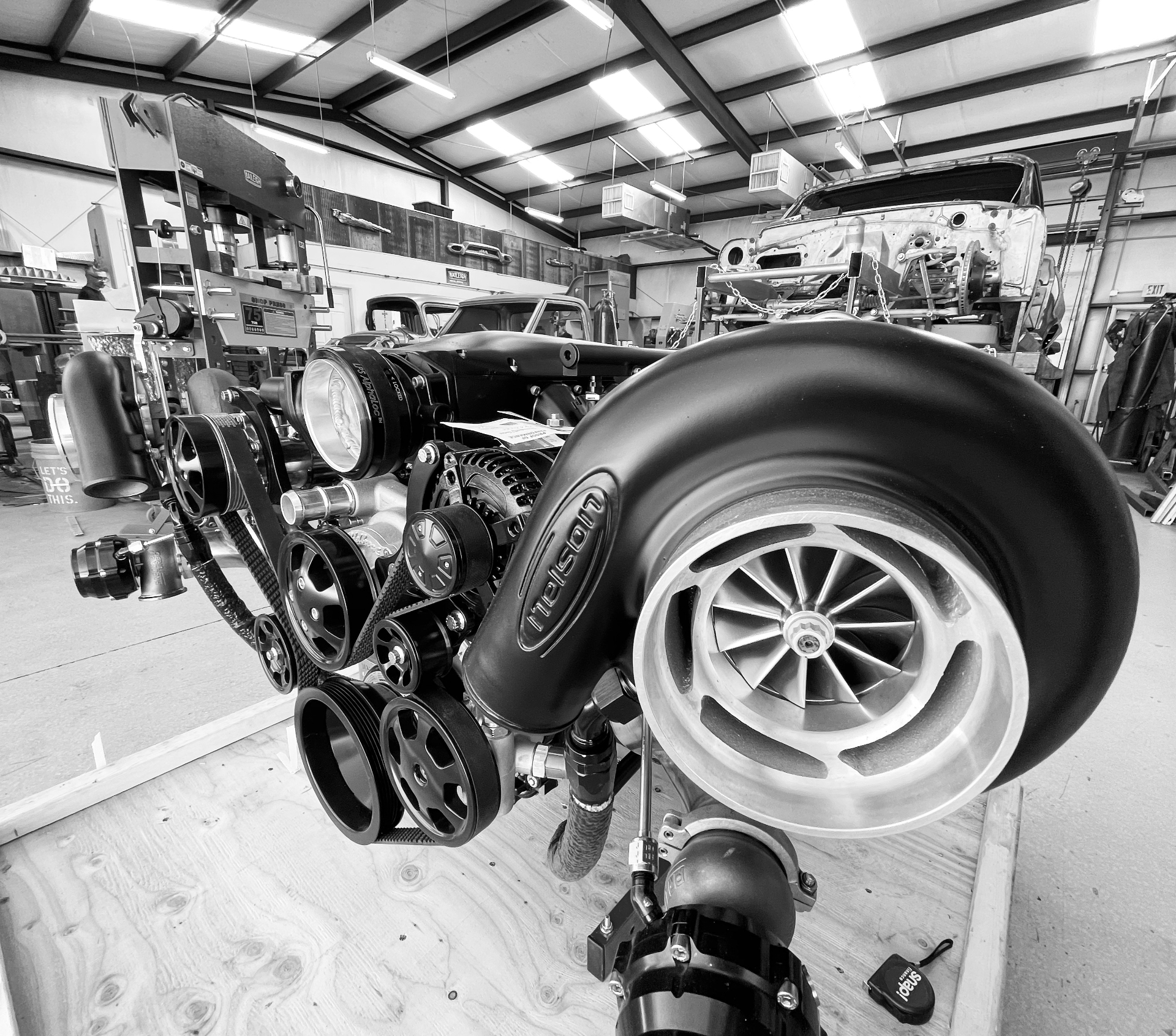Nelson-branded turbo, front accessory drive, and belt system — a look at the detail that will end up on display under the hood.