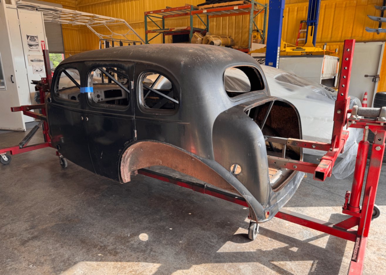 The body on the rotisserie, waiting to be stripped.