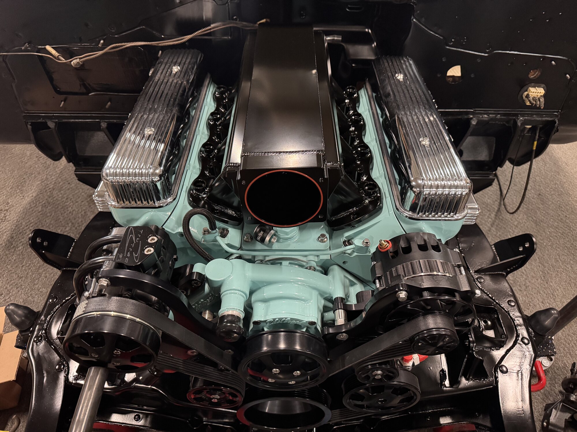 Overhead — the generic sheet metal intake that will get a custom billet lid to match the valve covers