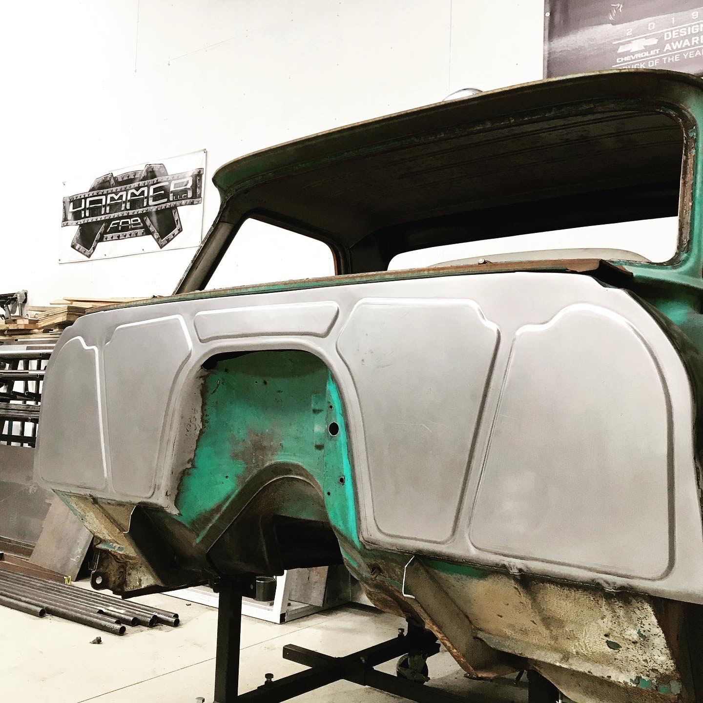 Installed in the cab — replaces the stamped factory firewall with a single hand-formed piece.