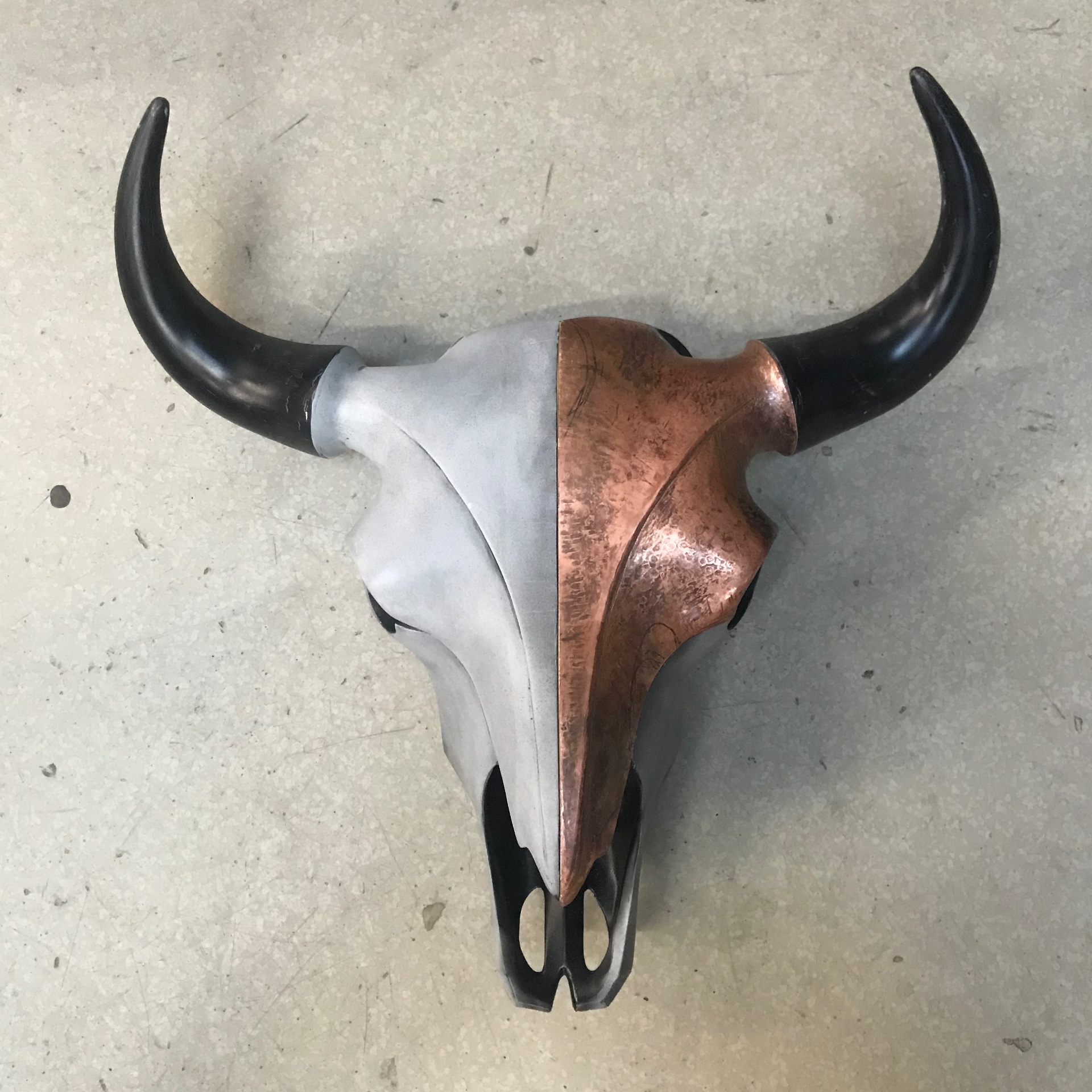 Half copper, half bare — front view.