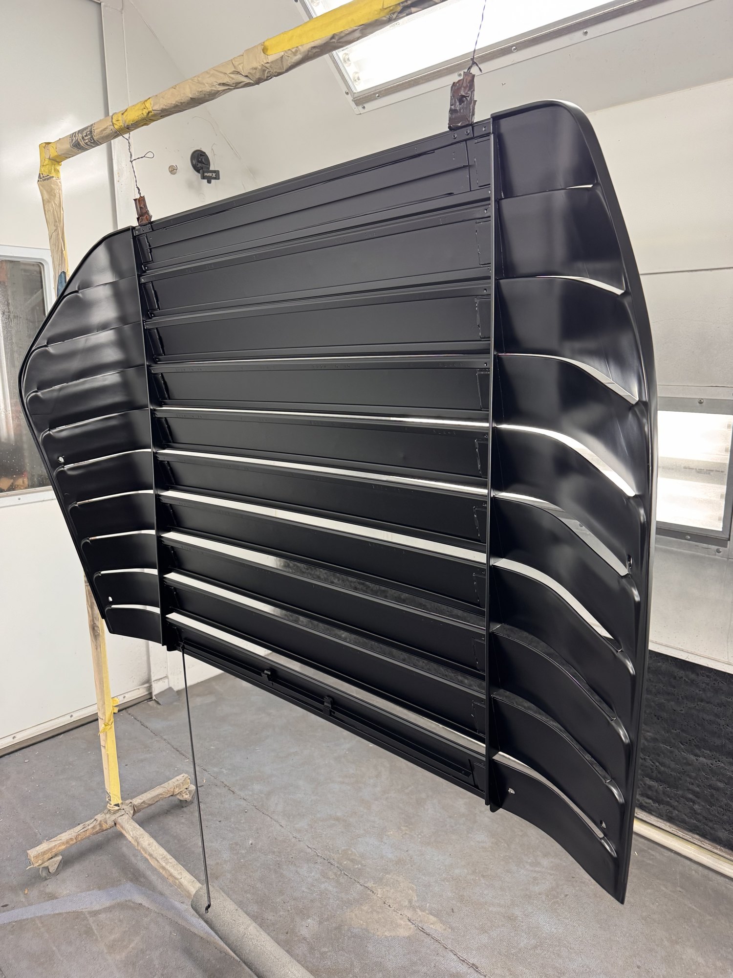 Underside detail — every slat and fastener boss addressed on the way to better-than-new.