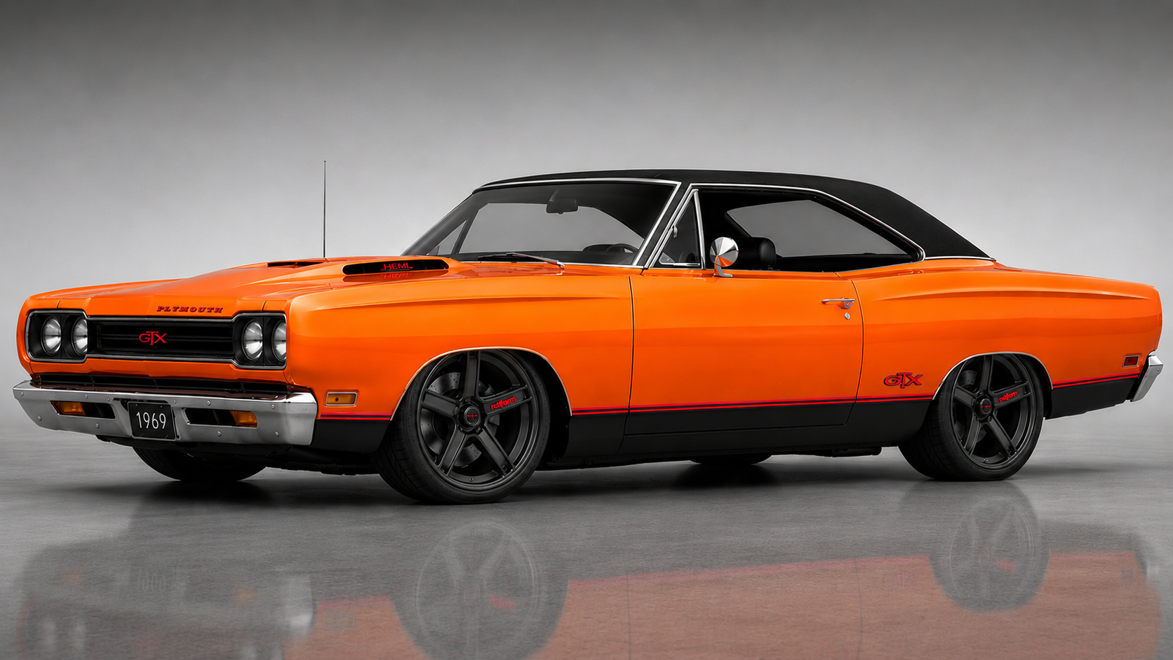Hemi orange with a black vinyl top and satin black wheels.