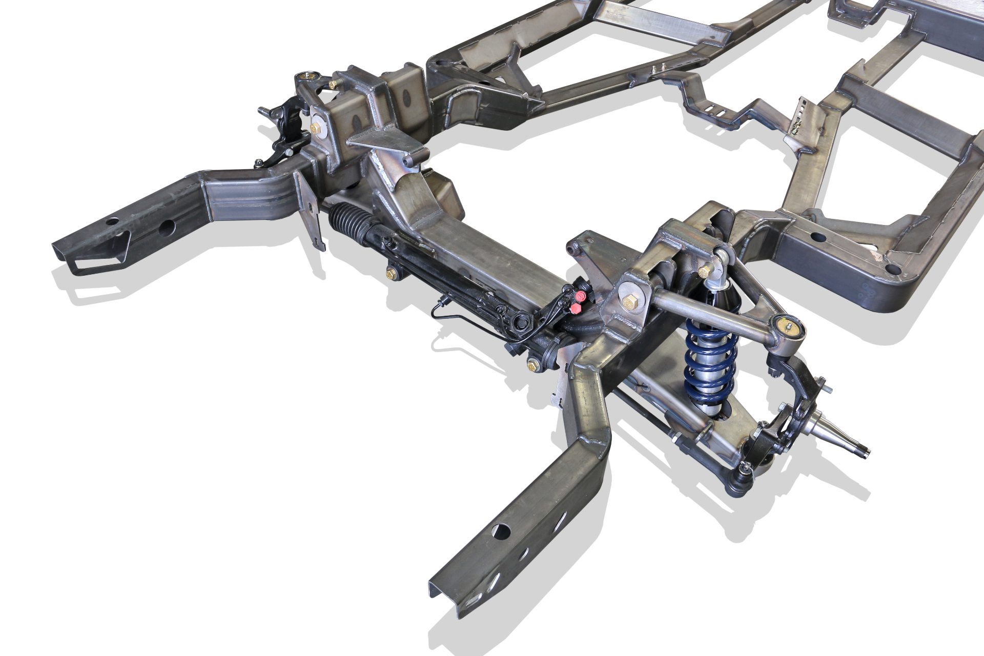 Front suspension detail — rack-and-pinion steering and tubular control arms.