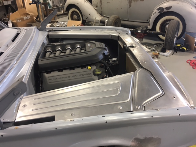 Panels installed over the Ford power in the Starliner's engine bay.