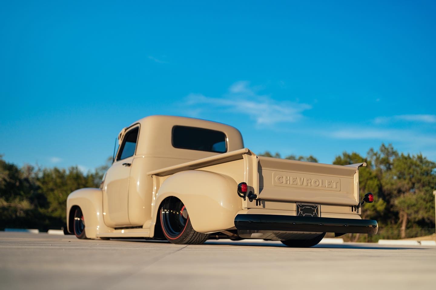 Rear — welded bed, custom tail light stems, HF tailgate stops (no chains).
