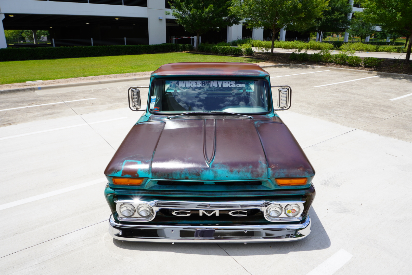 Straight-on hood shot showing the weathered original paint.