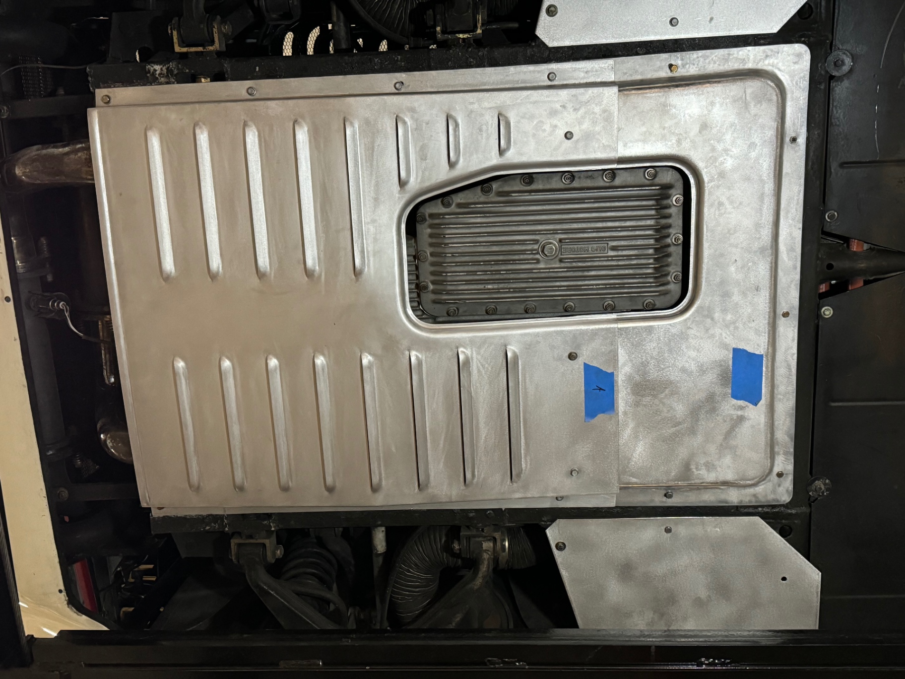 Installed under a Testarossa around the transmission pan.