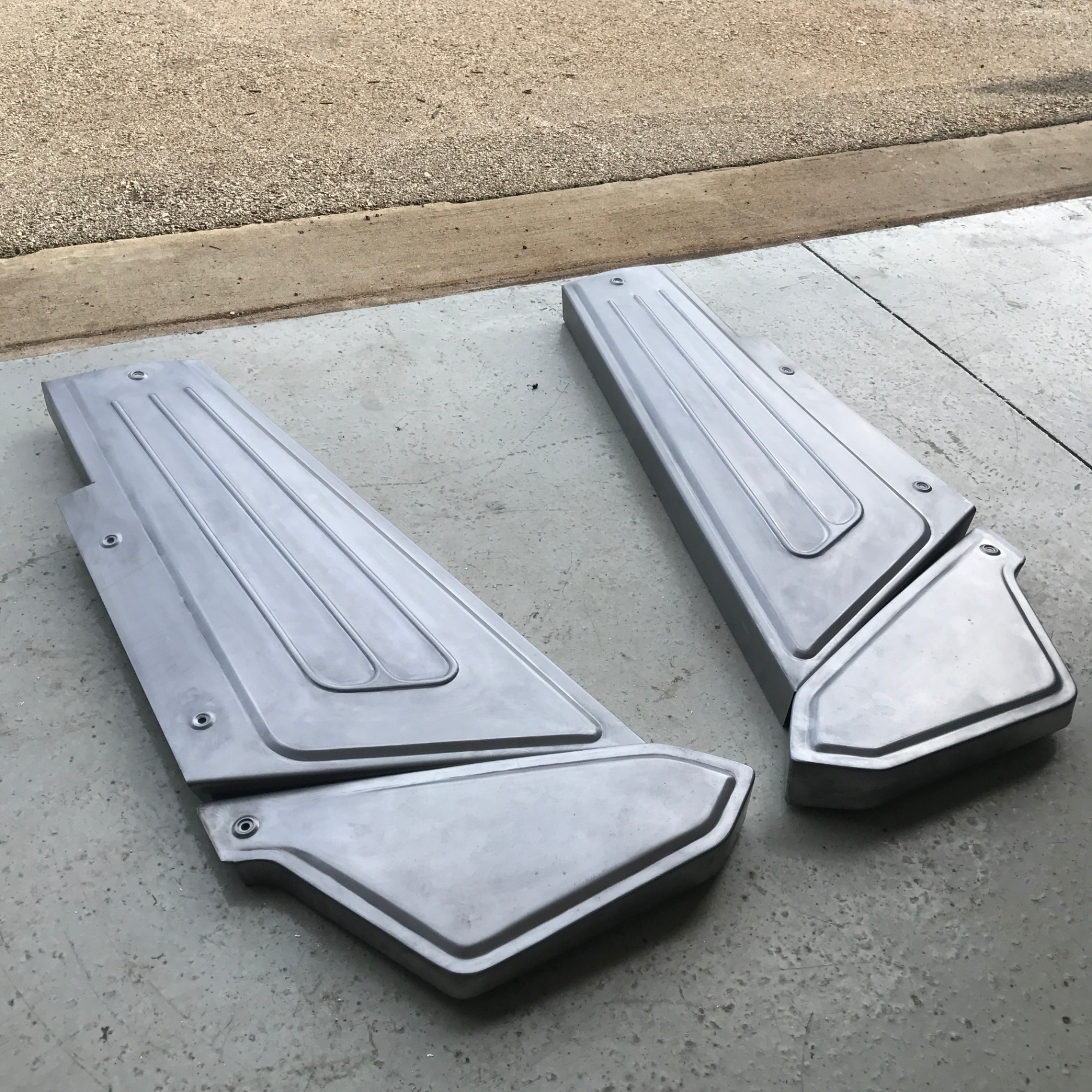 The finished set laid out — beads rolled for rigidity, edges shaped by hand.