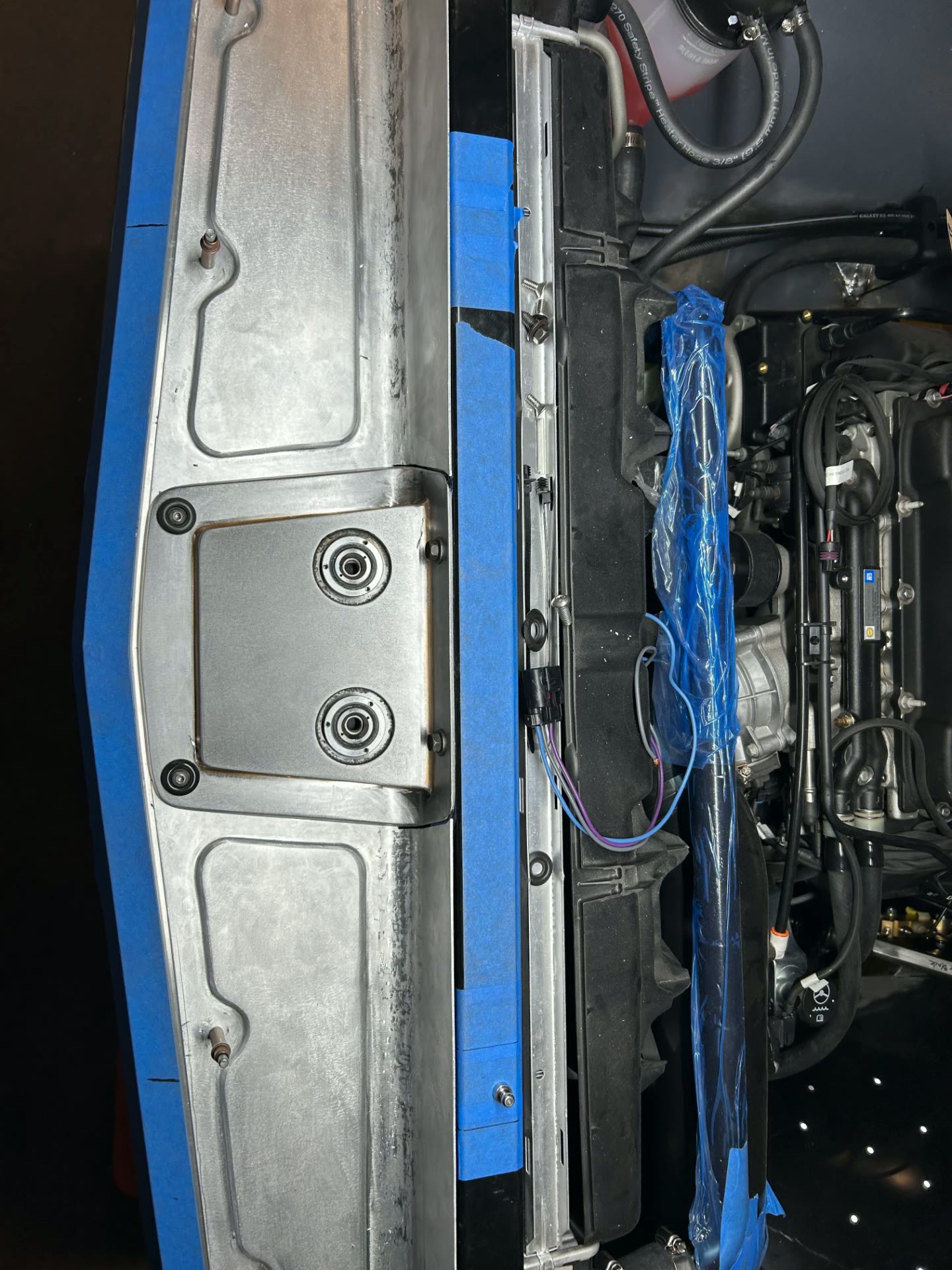Finished panel fitted at the front of the engine bay.