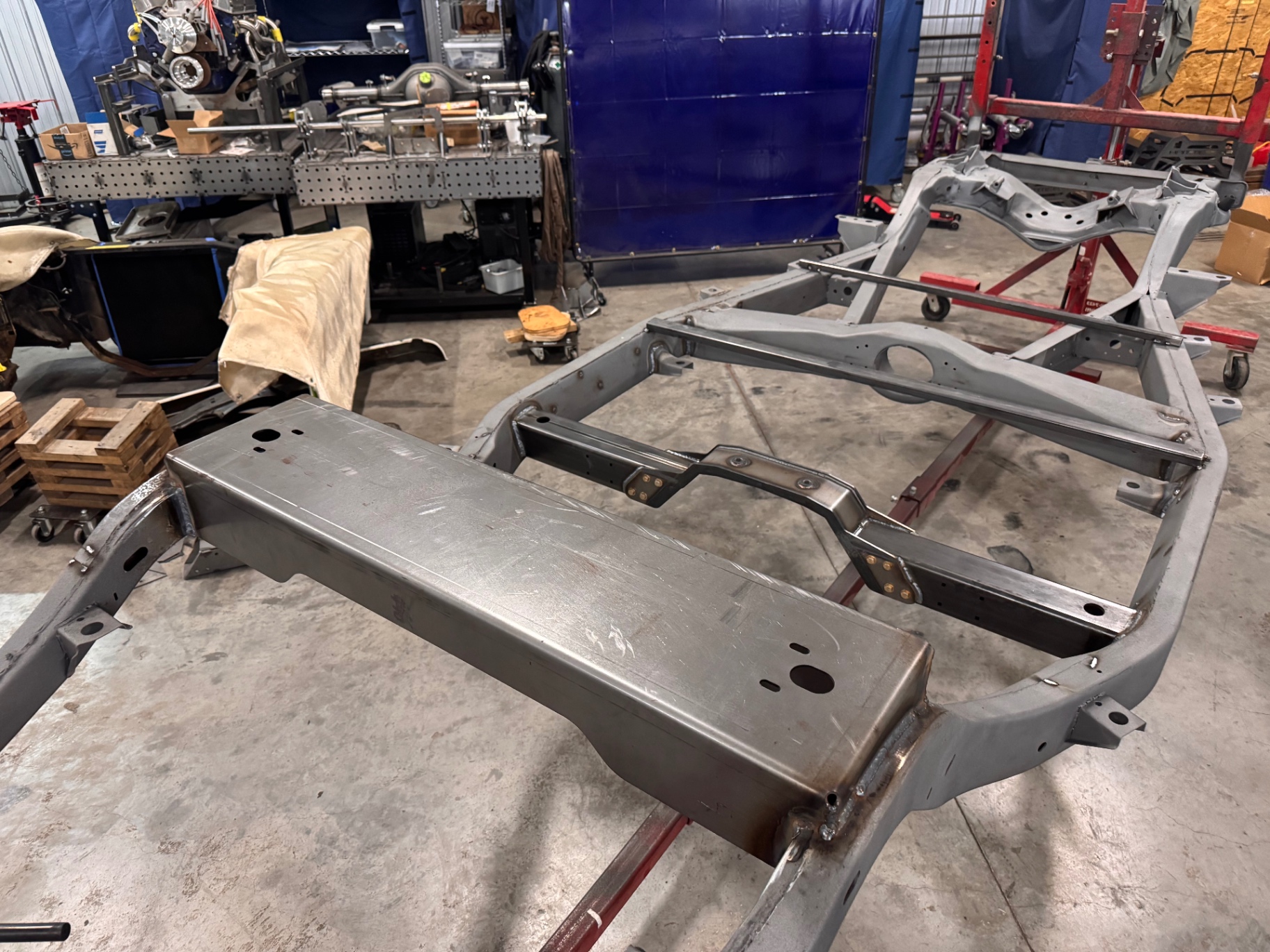Rear frame section with boxing plates and crossmember tacked in