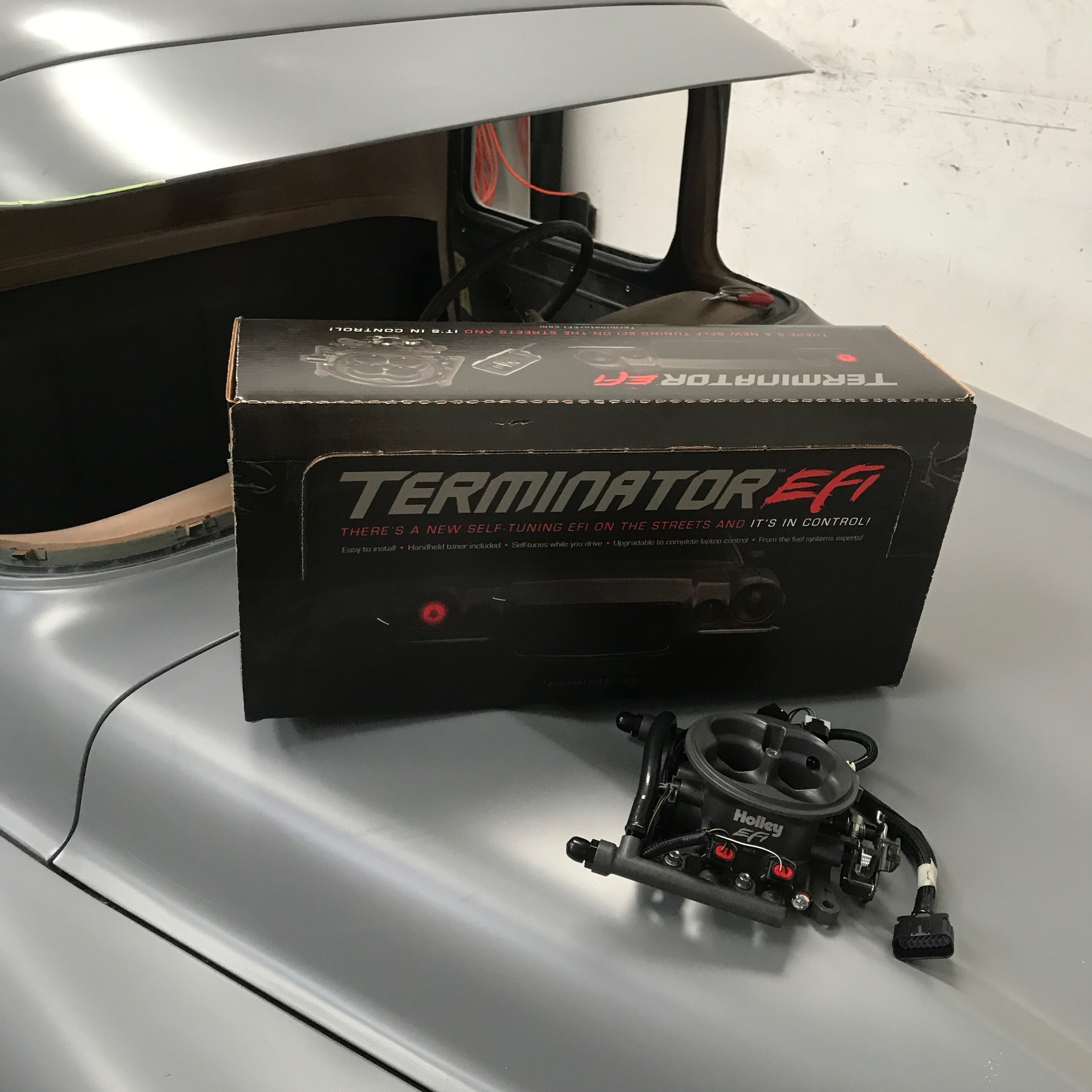 Holley Terminator X self-tuning EFI throttle body — the fuel injection setup for the 355 CI small block.