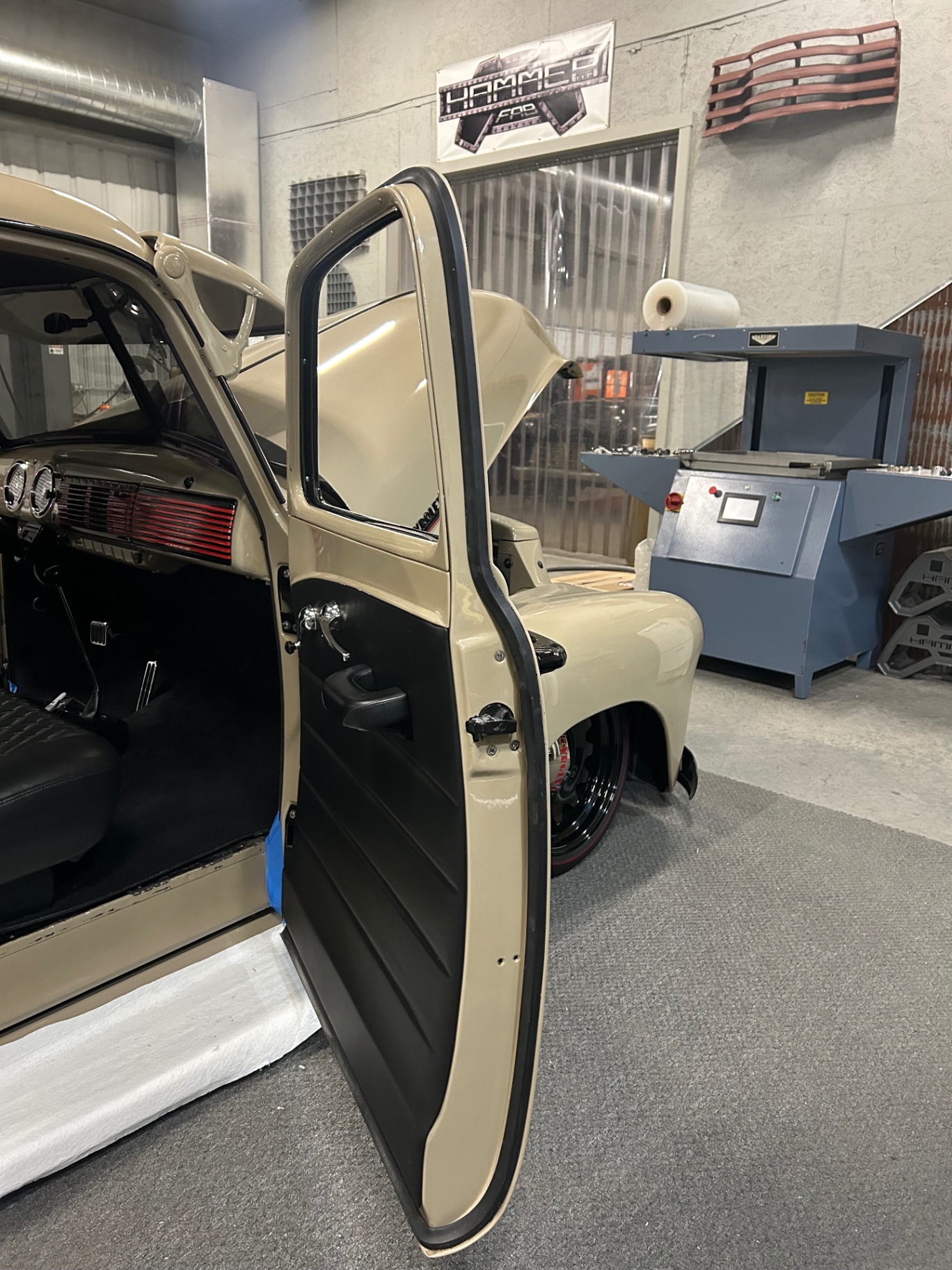 Door open on the truck — panel edges sit tight to the sheet metal, no bulk.