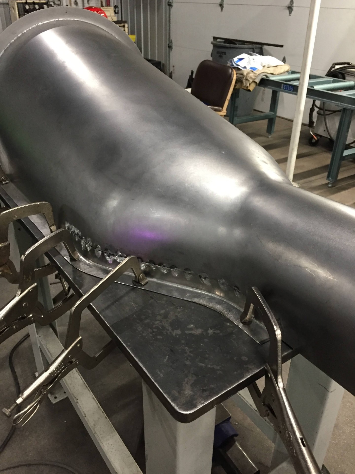 Full-length TIG weld running along the tunnel-to-rocker seam.
