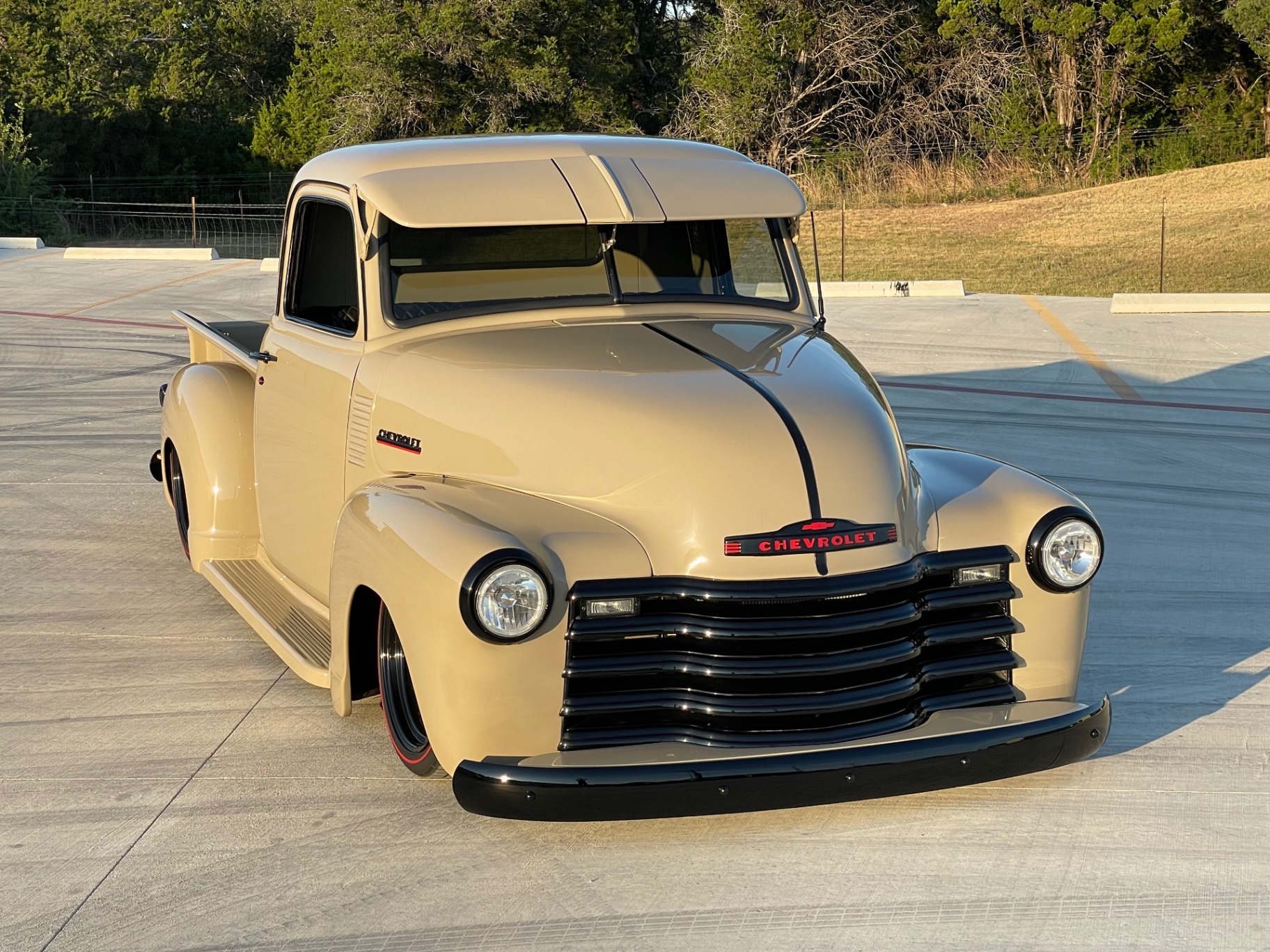 High three-quarter — hood, cab, and bed lines together in one frame.