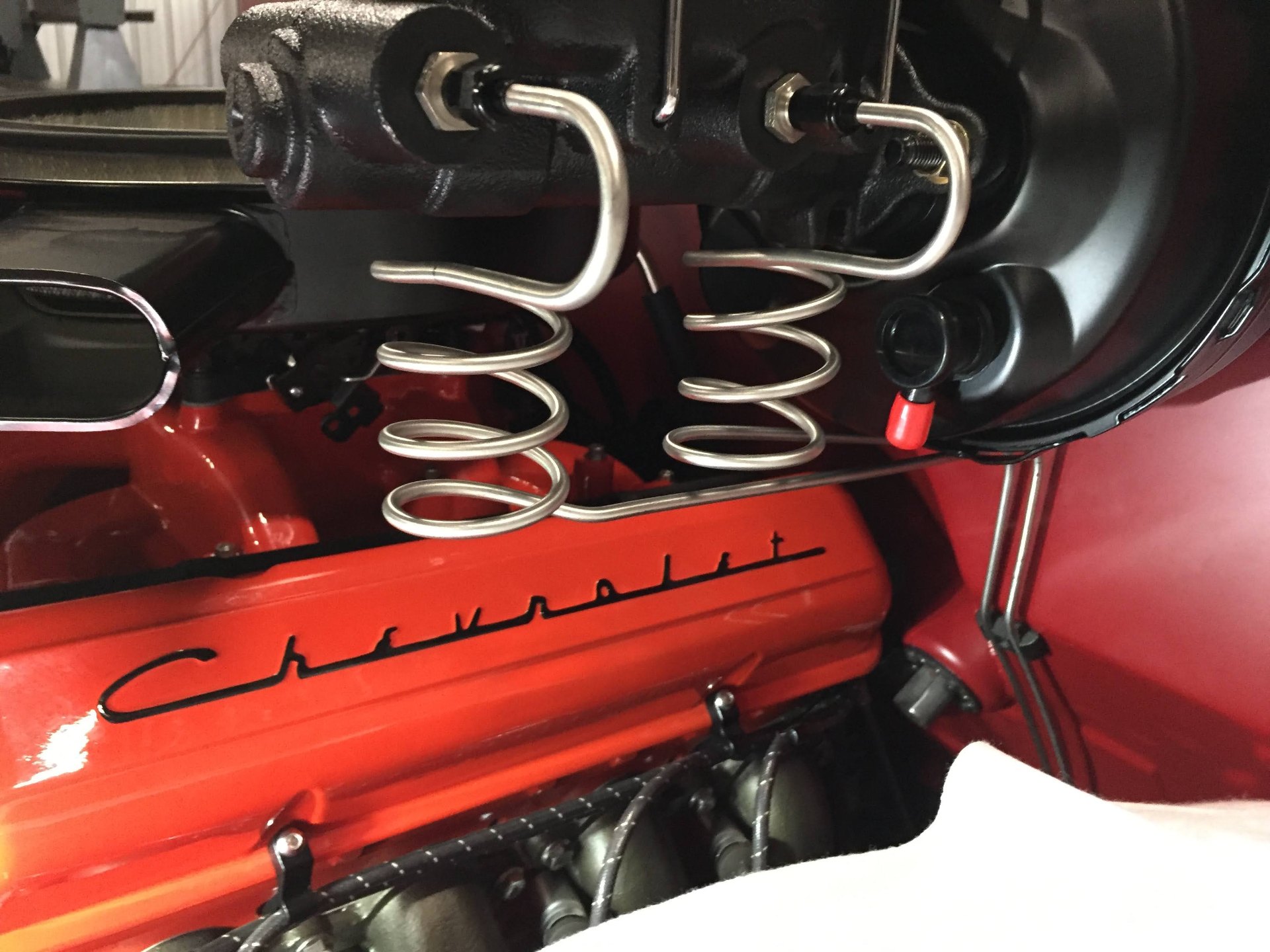 Brake line detail — hand-formed loops at the master cylinder. Details most people overlook.