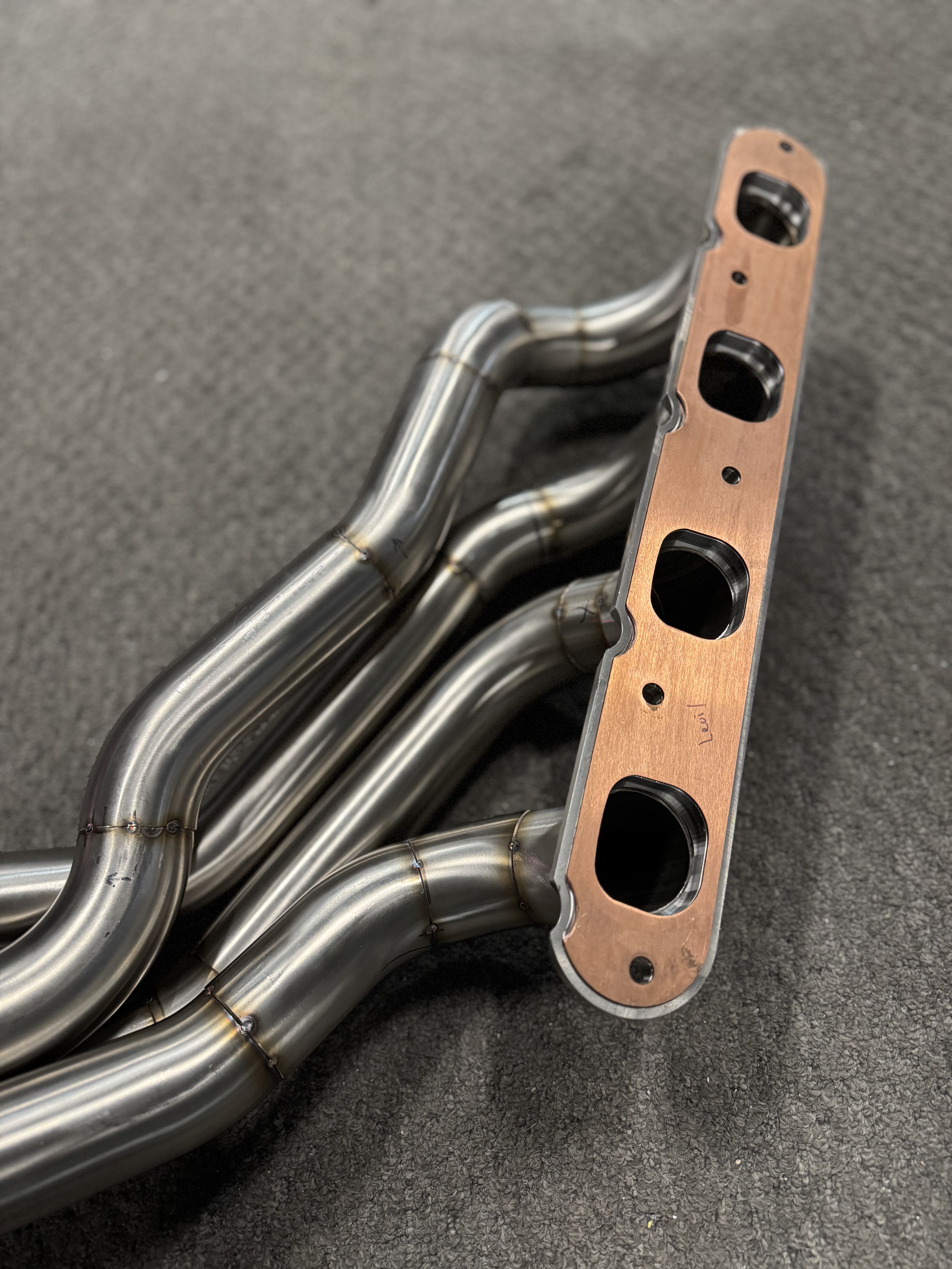 1-7/8" stainless primaries stepping off the machined flange.