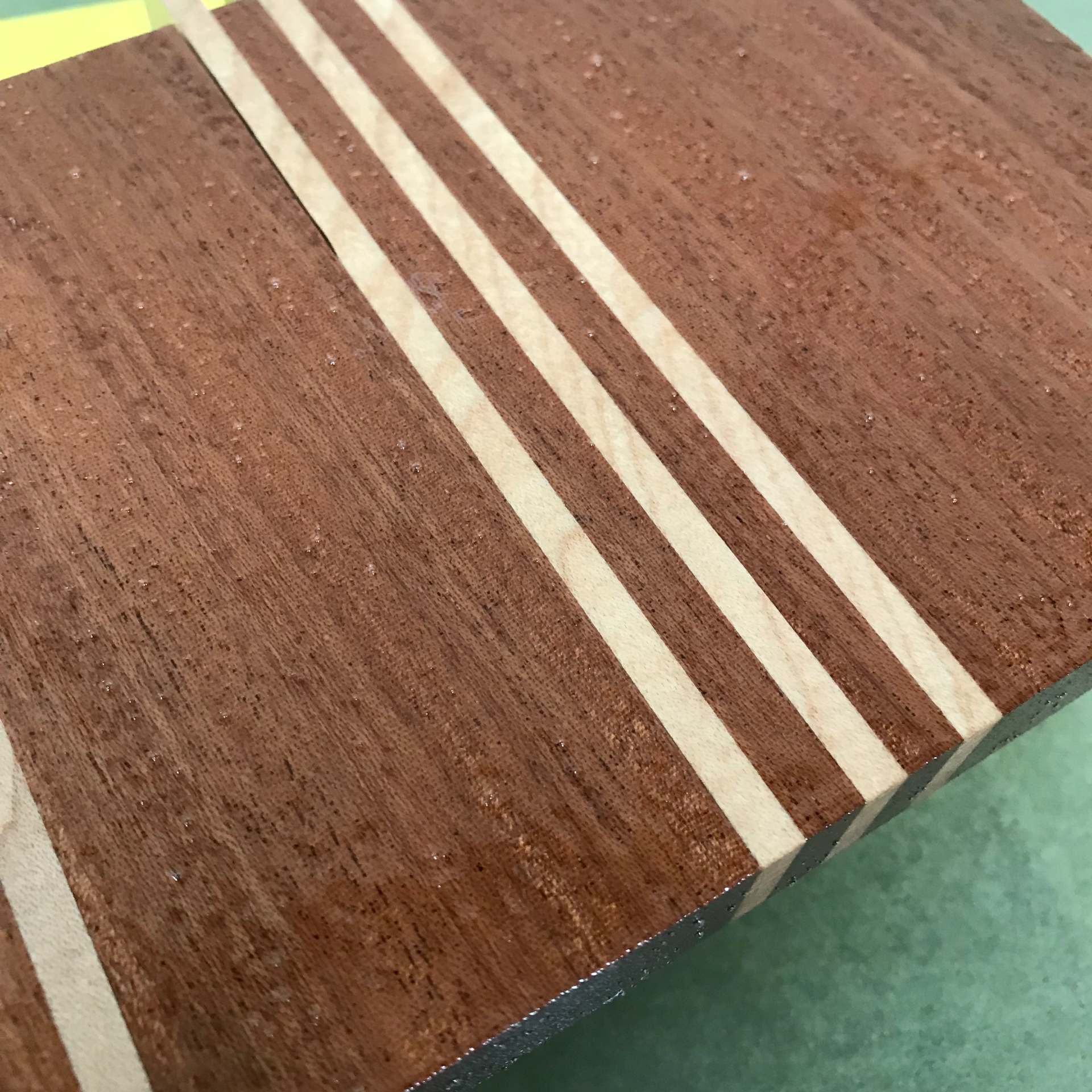 Mahogany with maple inlays — interior trim sample.