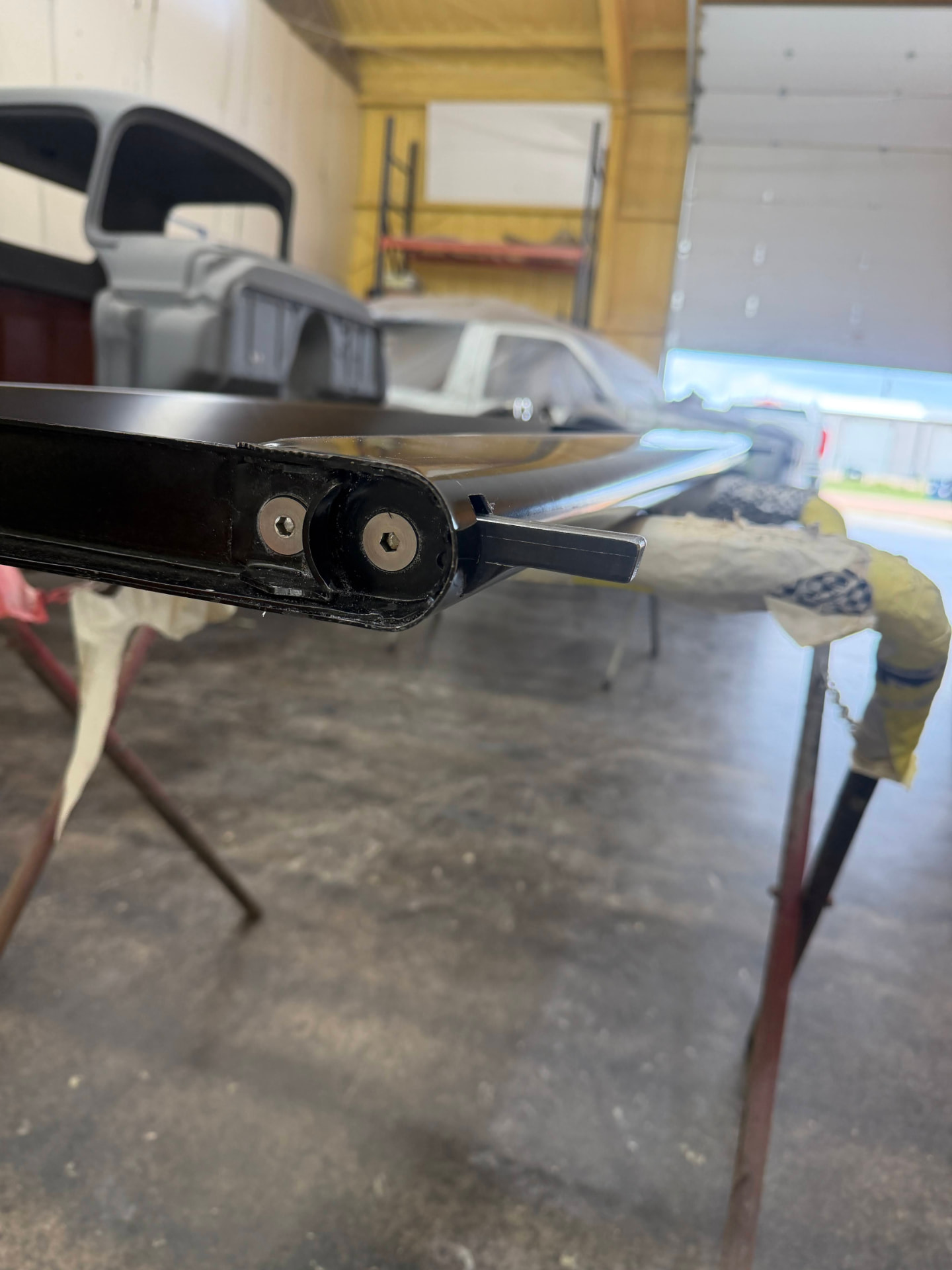 Hinge and pivot hardware sorted on the freshly finished tailgate.