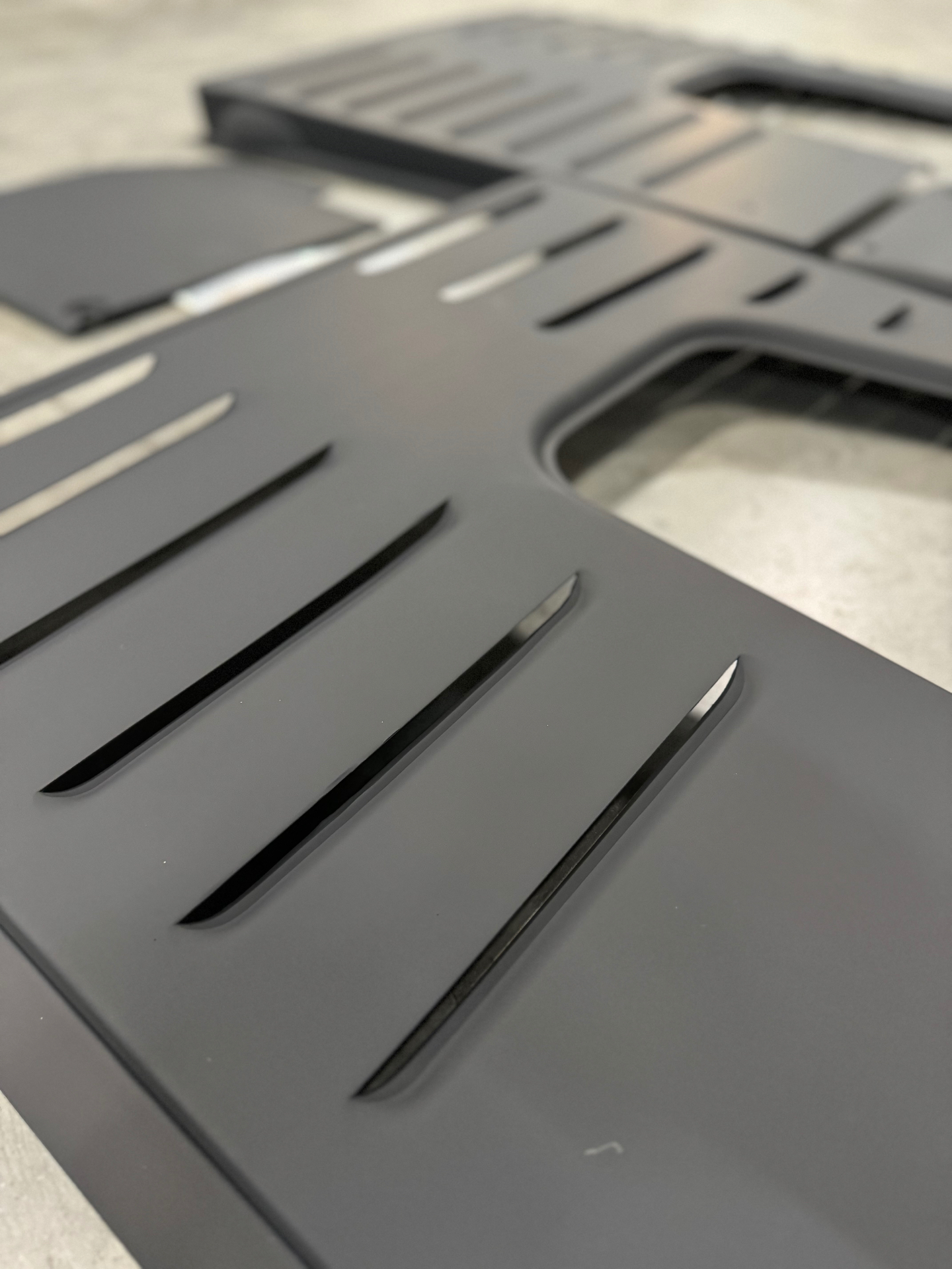 Louver detail — hand-formed in aluminum.