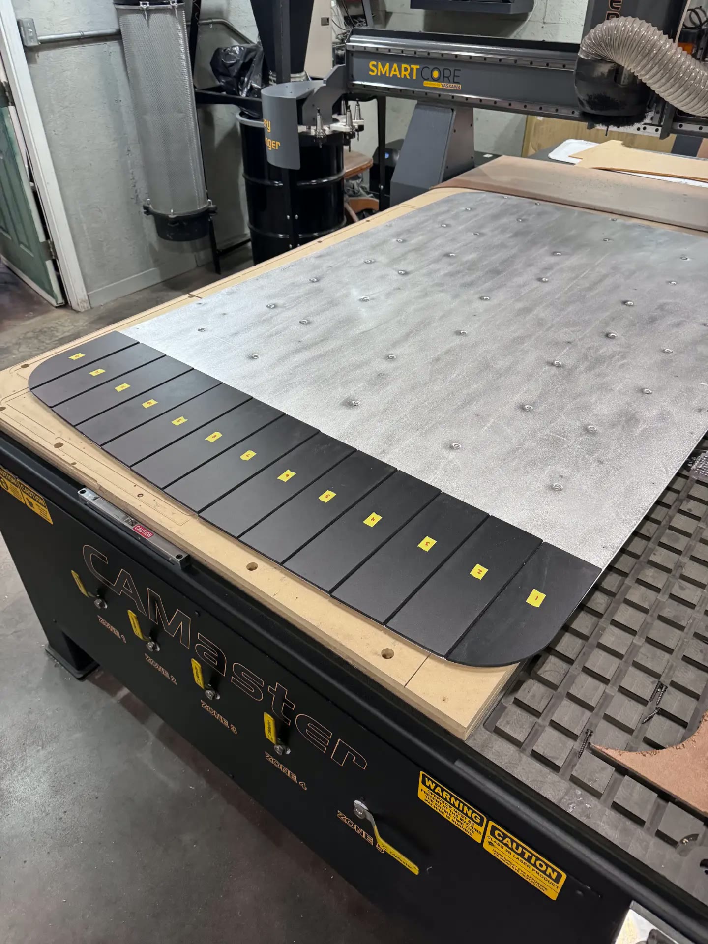Headliner panel segments cut on the CNC and numbered in order.