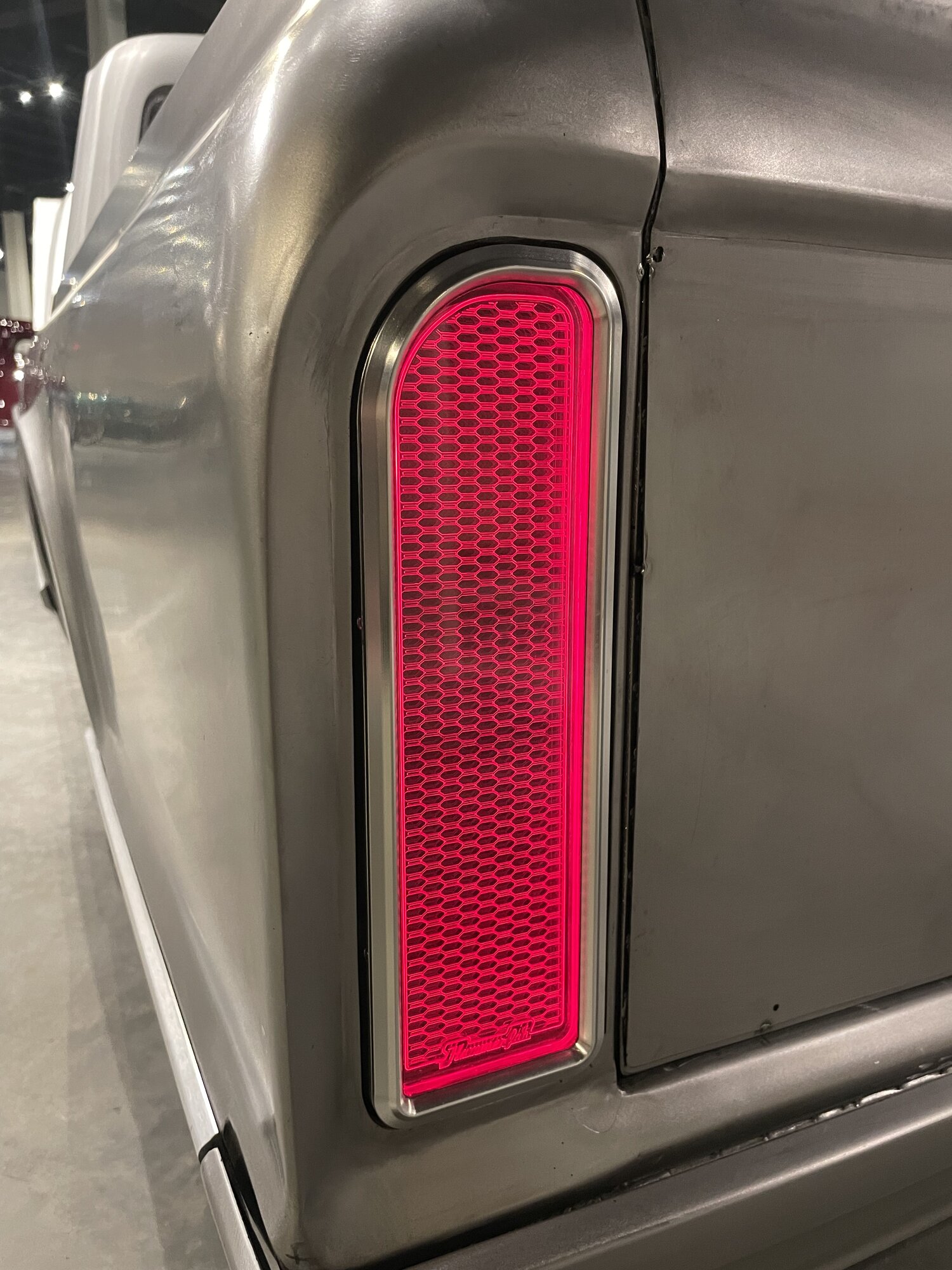 One-off billet tail light lit up.