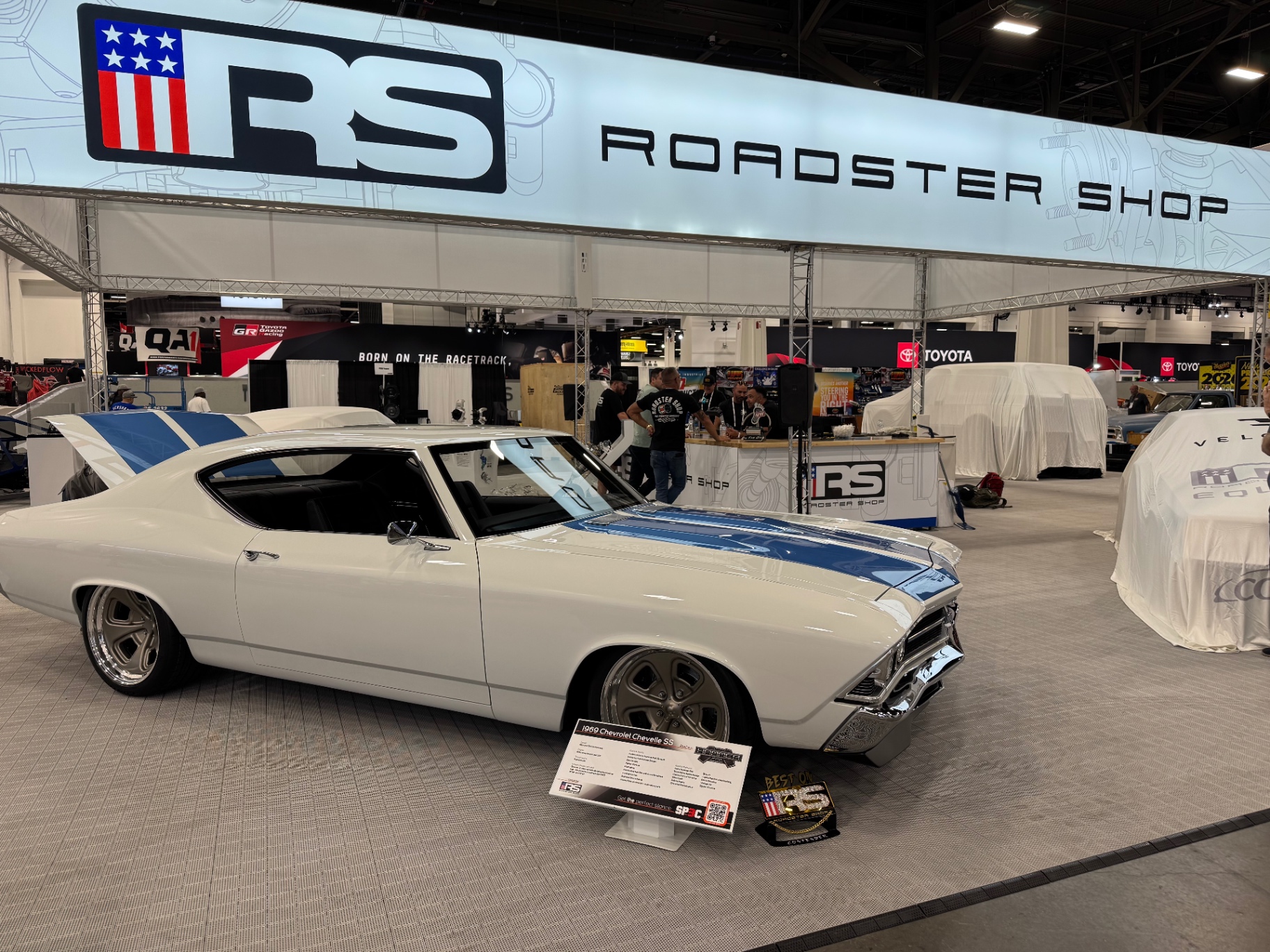 SEMA 2025 — parked under the Roadster Shop banner on debut day.
