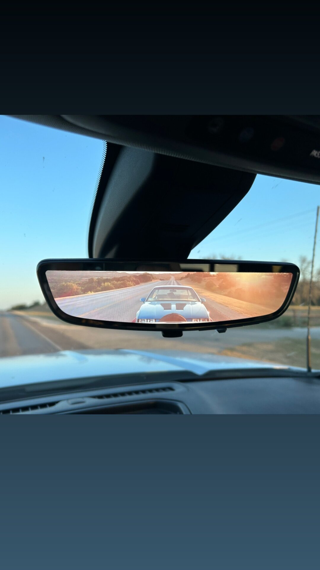 Following it home in the mirror.