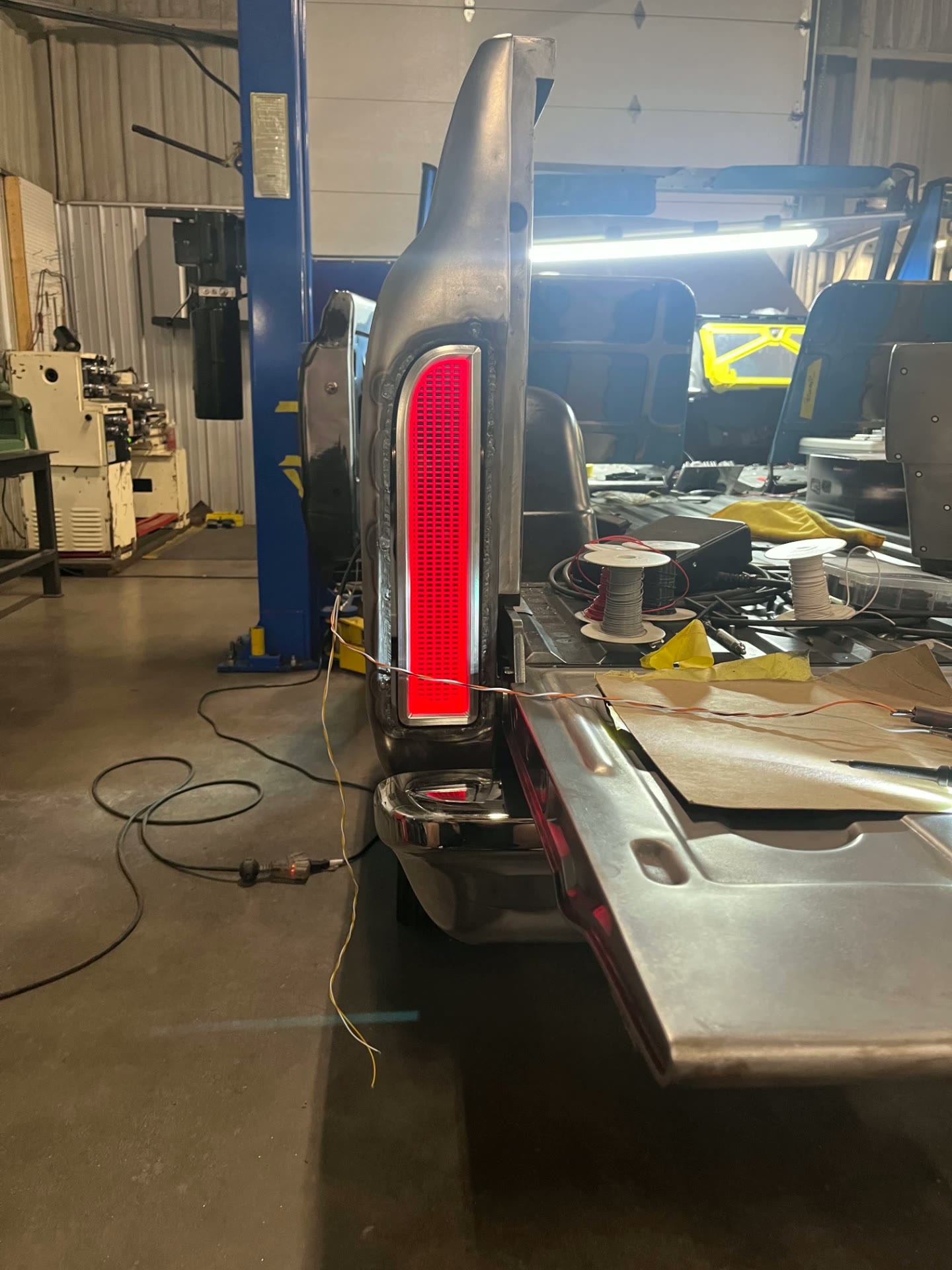 Billet tail light lit up and test fit in the rear corner.