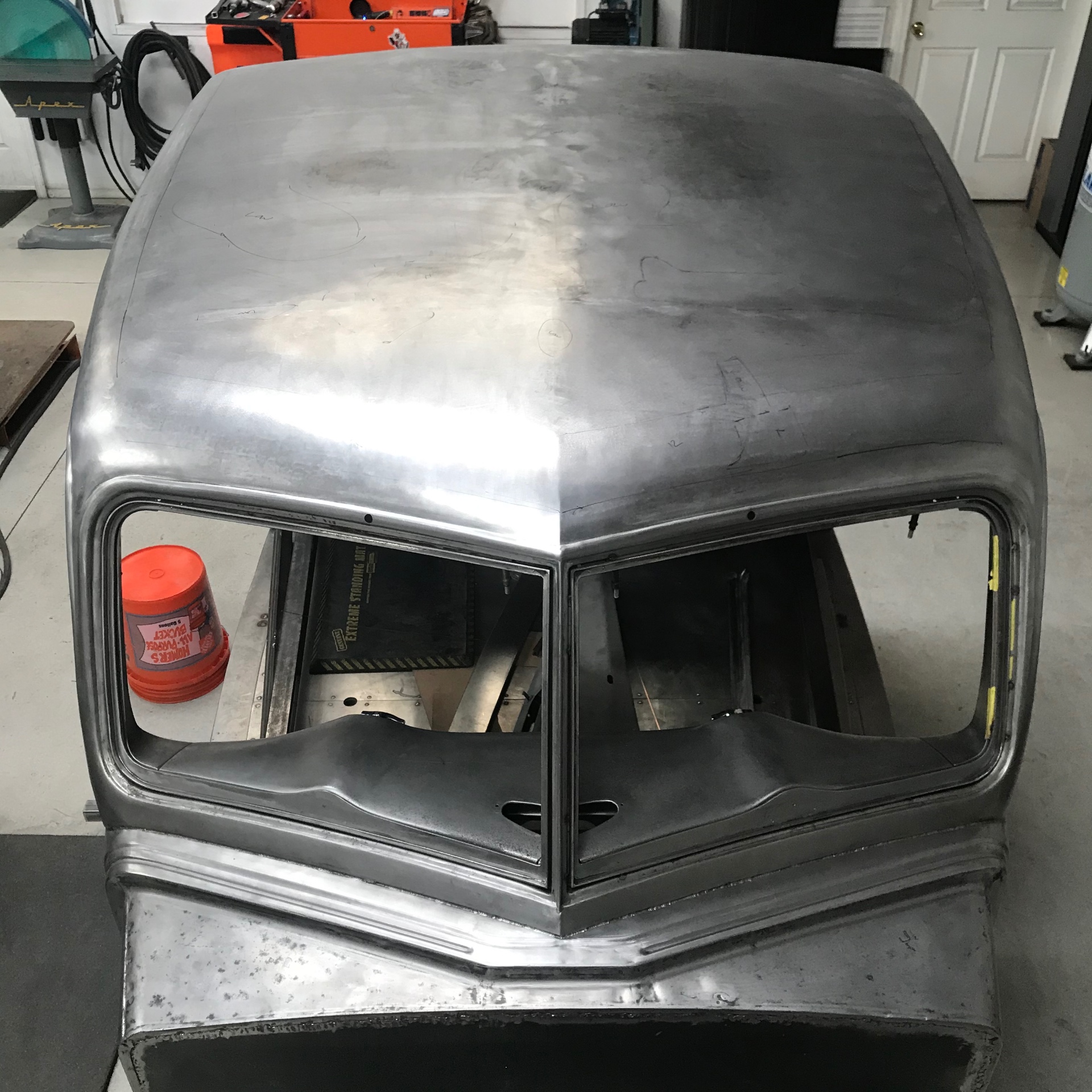 Front three-quarter view showing the stretched roof and reworked cowl.