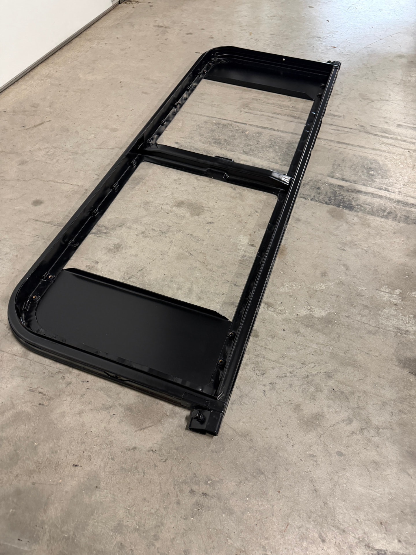Original seat frame, stripped and freshly powder coated black.
