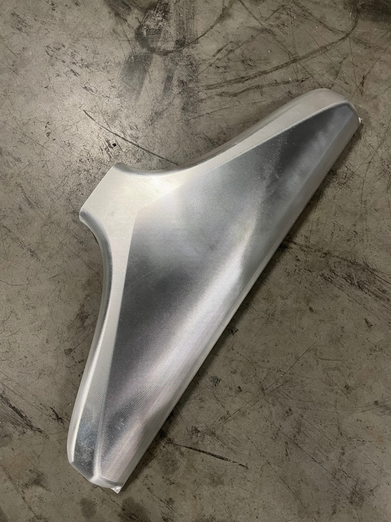 Side profile of the billet funnel — this piece TIG welds directly to the top of the intercooler.